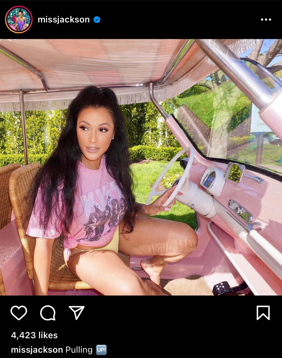 Shantel Jackson displaying her legs as she rode a pink golf cart in an oversized shirt and underwear. | Photo: instagram.com/missjackson