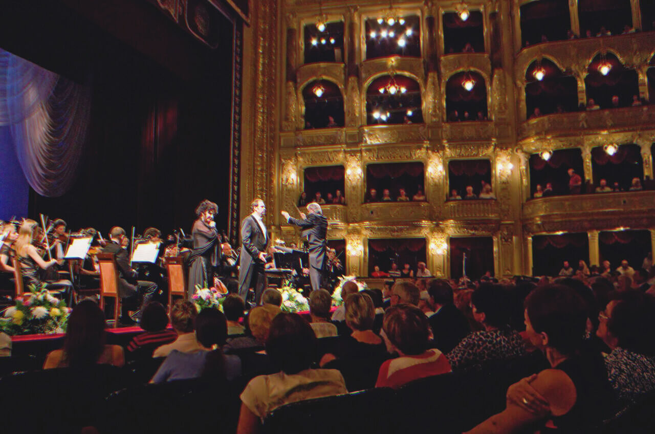 People in an opera hall | Source: Shutterstock