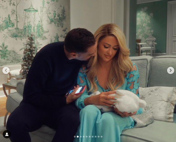 Carter Reum and Paris Hilton holding their baby posted on December 12, 2023 | Source: Instagram/parishilton