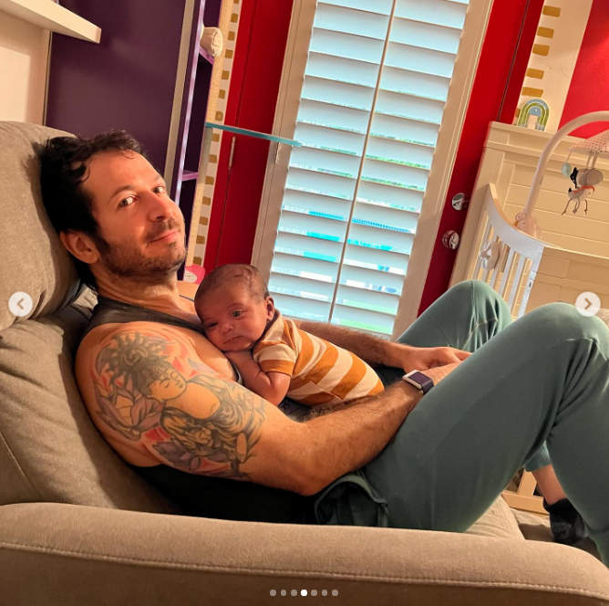 Brandon Frankel with one of his children, from a post dated June 16, 2024 | Source: Instagram/gaboureysidibe