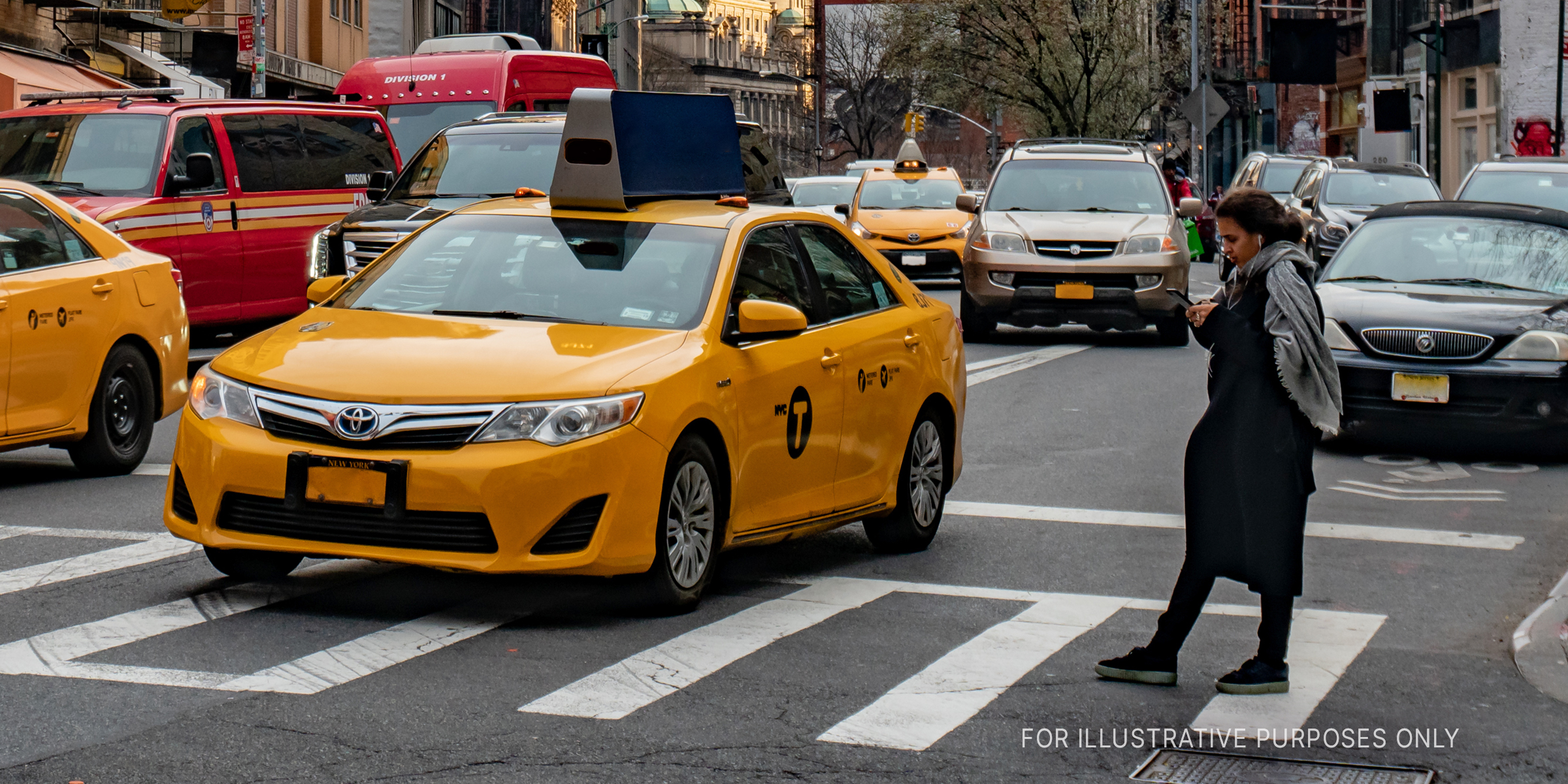 Taxi on a busy road | Source: Shutterstock