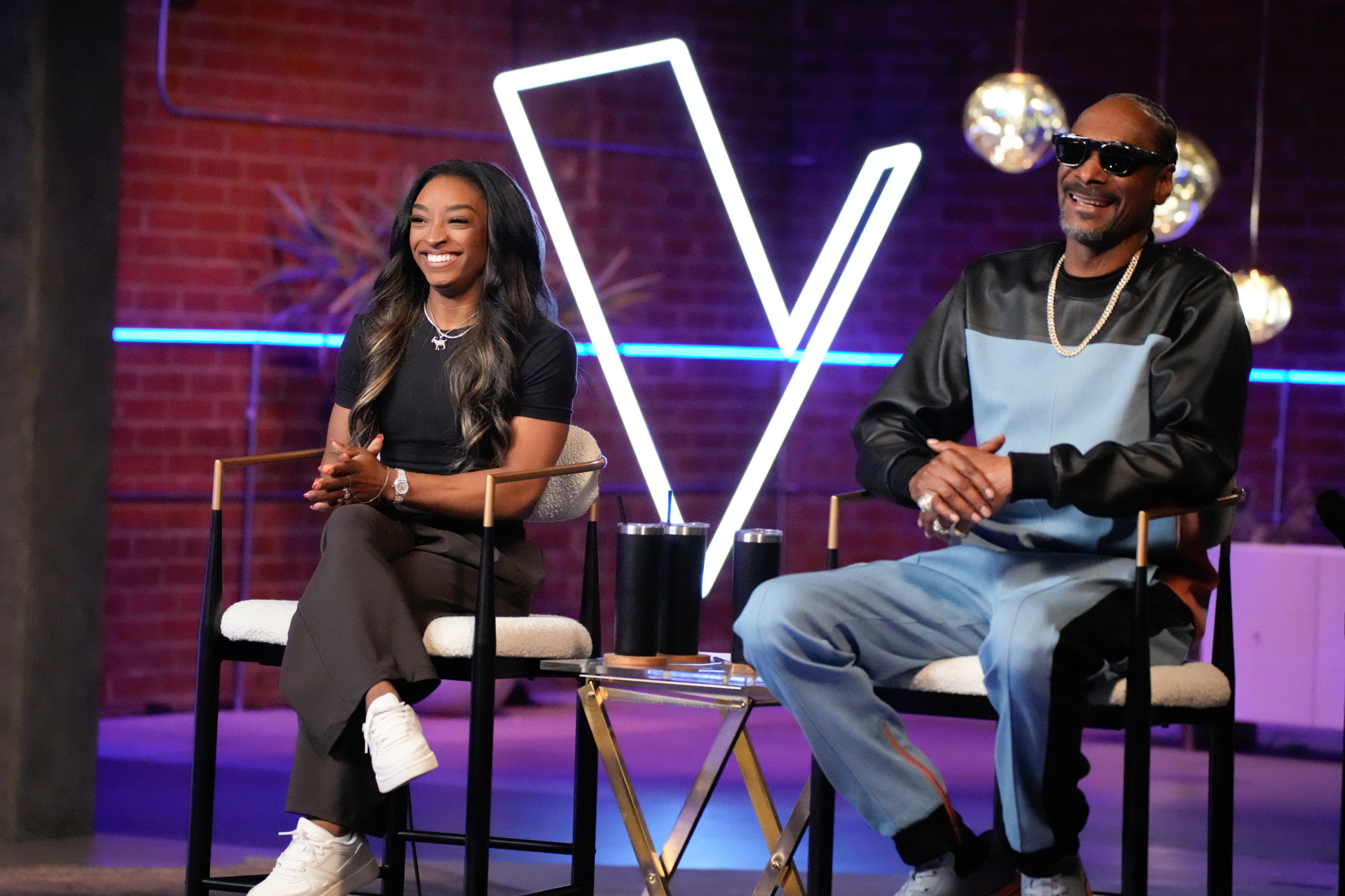 Simone Biles and Snoop Dogg. | Source: Getty Images