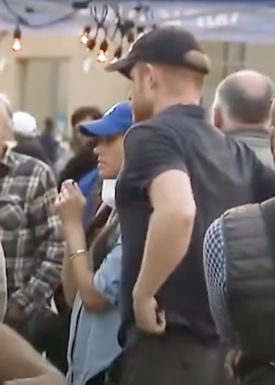 Prince Harry and Meghan Meghan photographed during the wildfire aftermath | Source: YouTube/TheRoyalFamilyChannel