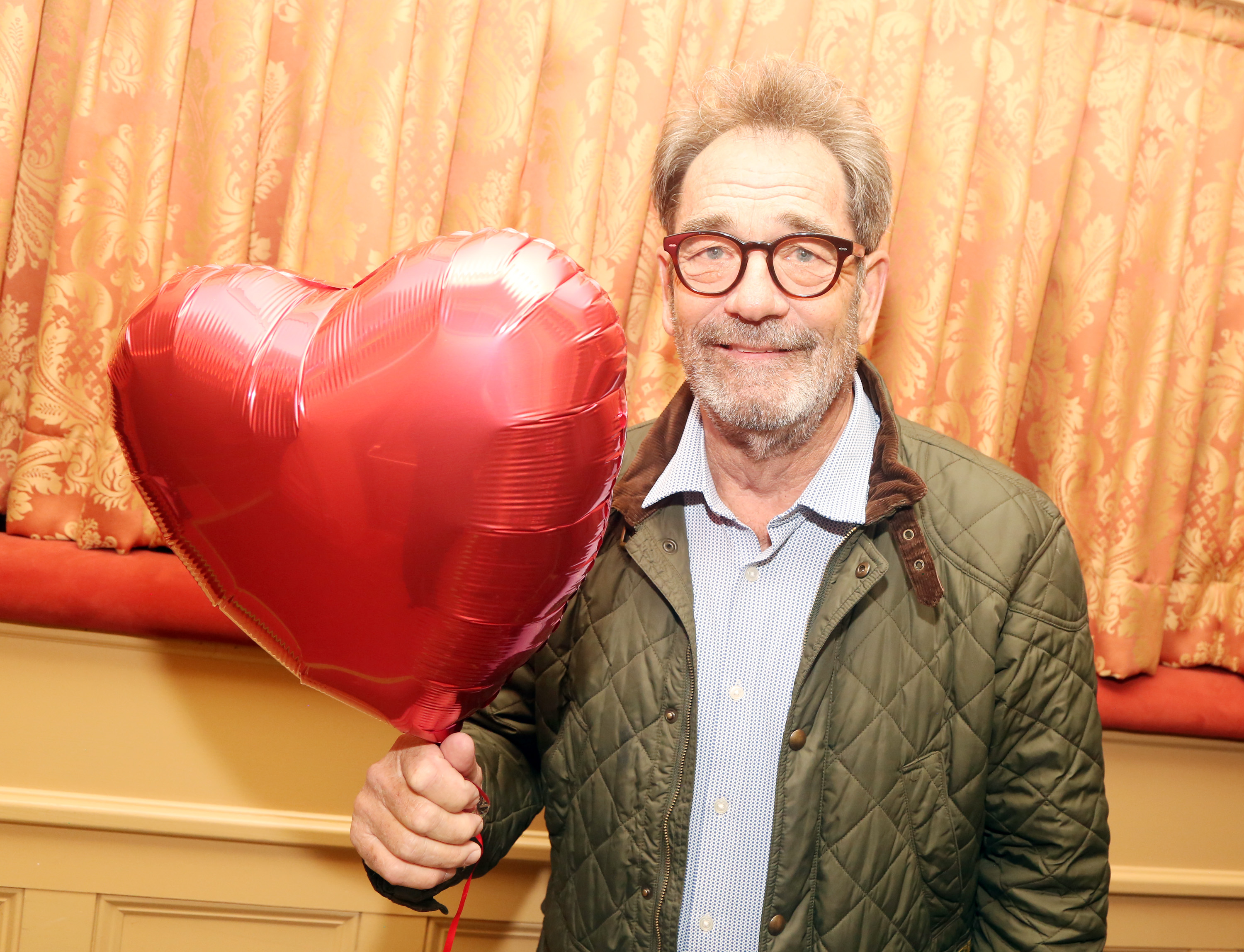 Huey Lewis at the box office opening for the new musical featuring his music "The Heart of Rock & Roll" on Broadway on February 14, 2024, in New York City. | Source: Getty Images
