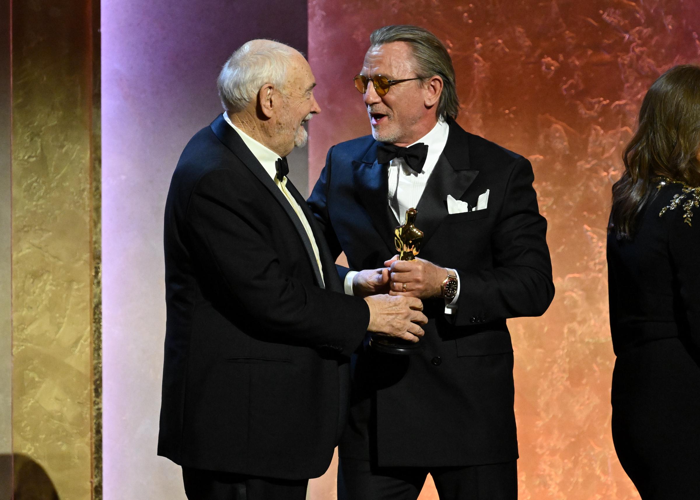 Michael G. Wilson and Daniel Craig onstage at the 15th Governors Awards on November 17, 2024, in Los Angeles, California. | Source: Getty Images