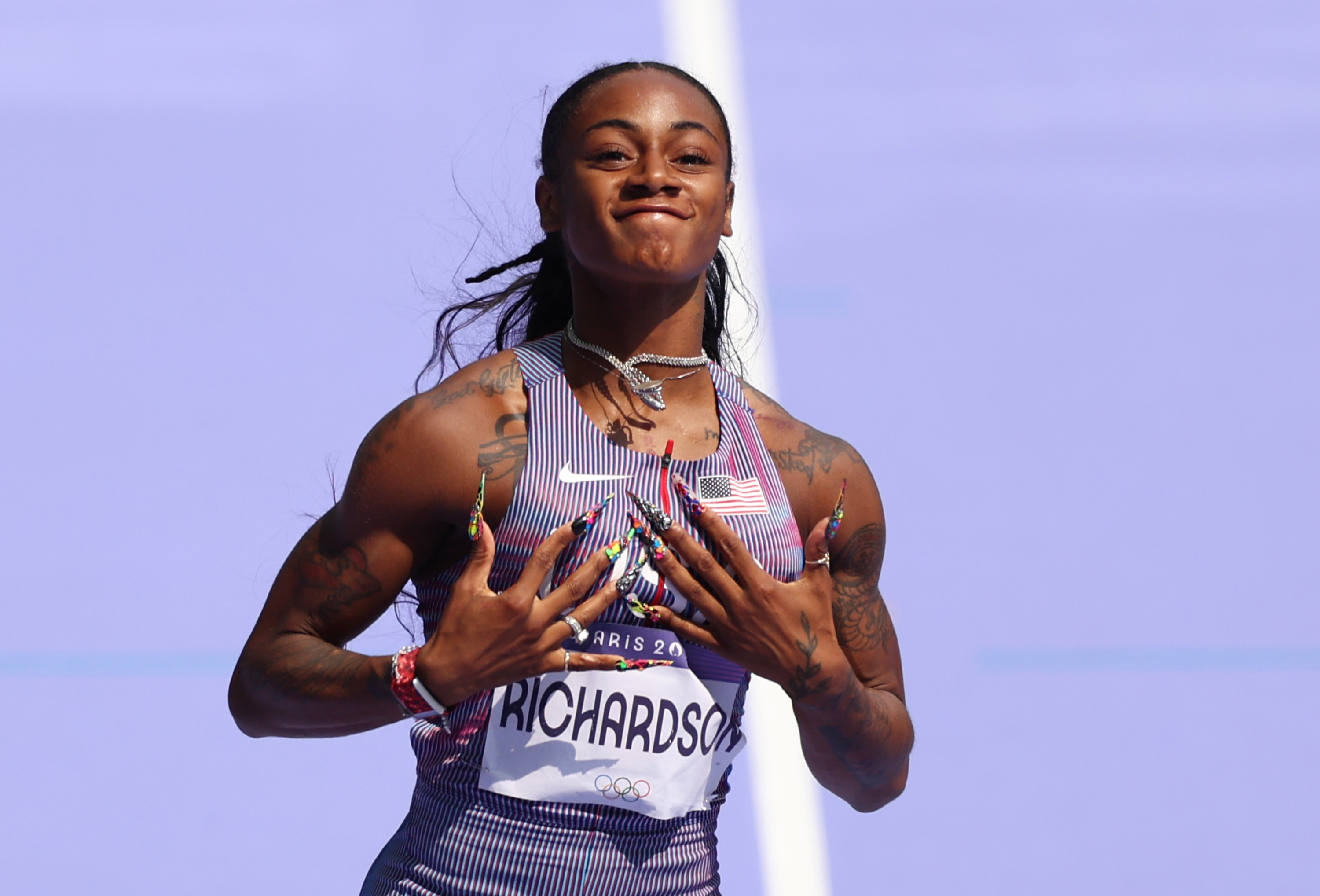 Sha'Carri Richardson during round 1 of the women's 100m at the Paris Olympics in Paris, France on August 2, 2024 | Source: Getty Images