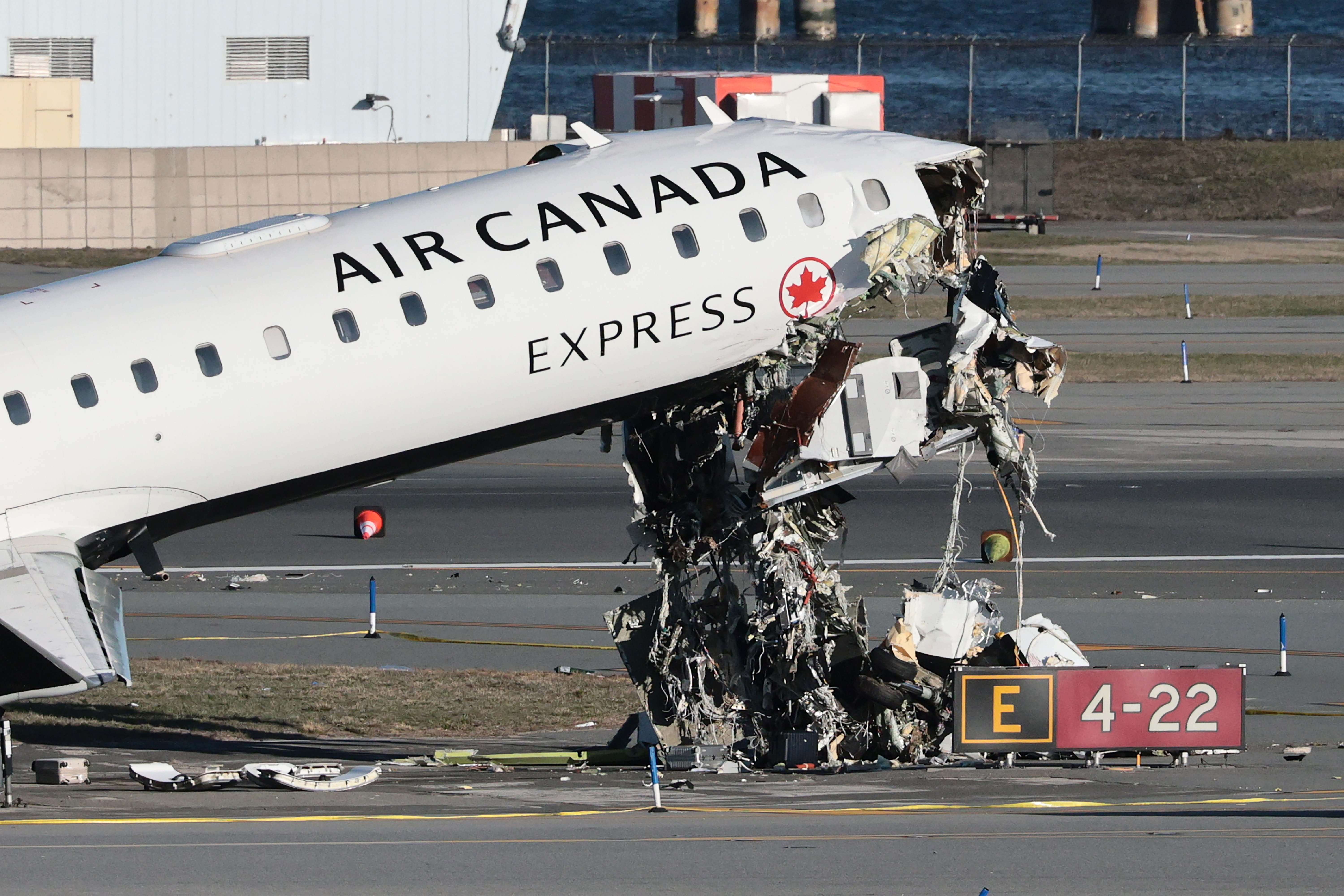 An Air Canada Express CRJ-900 sits on the runway after colliding with a Port Authority fire truck at LaGuardia Airport on March 24, 2026 in New York City | Source: Getty Images