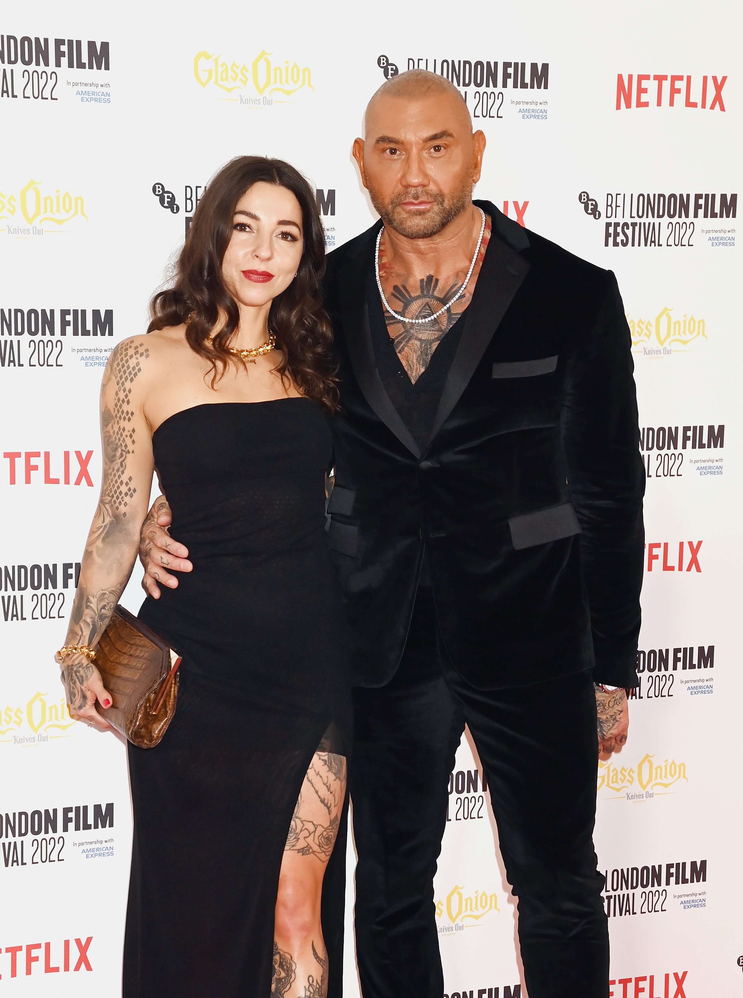 Dave Bautista and his date at the "Glass Onion: A Knives Out Mystery" European Premiere Closing Night Gala during the 66th BFI London Film Festival on October 16, 2022, in England. | Source: Getty Images