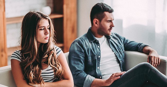 A man and a woman wearing angry looks on their faces | Photo: Shutterstock