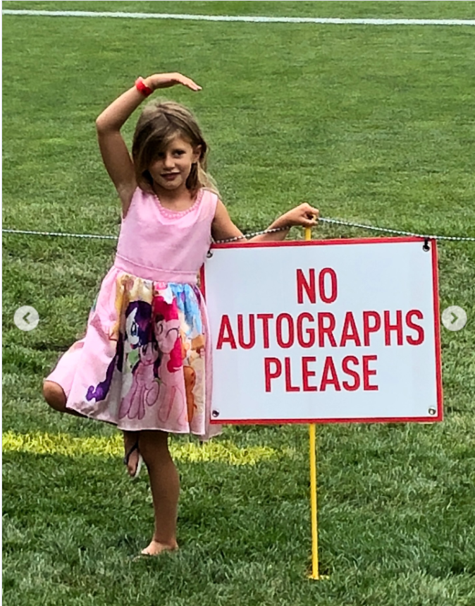 A young Vivian is in a pink dress, as seen from a post dated December 5, 2025. | Source: Instagram/tombrady