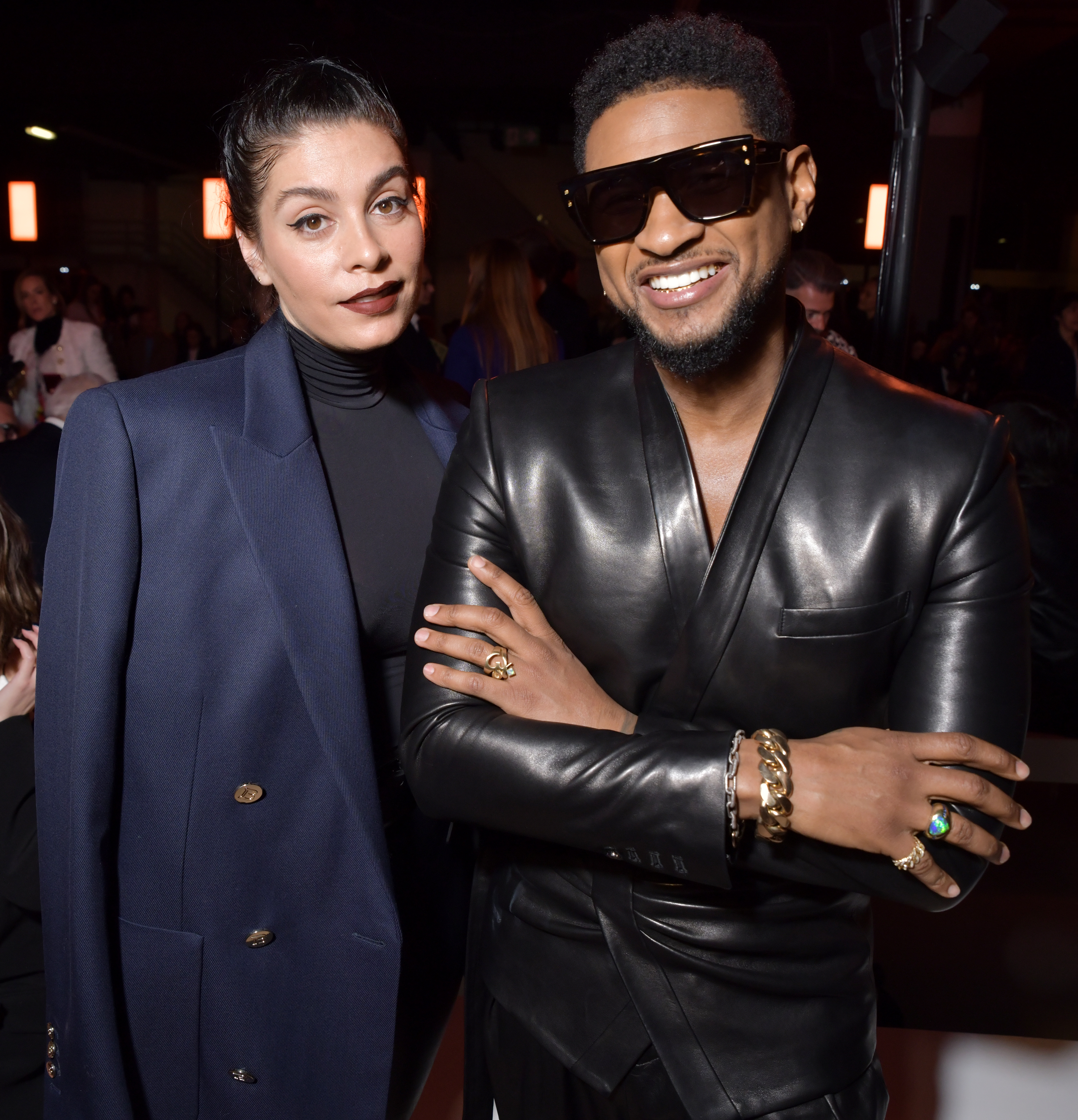 Jenn Goicoechea and Usher in the front row of the Balmain Fall/Winter show at Paris Fashion Week, on February 28, 2020  | Source: Getty Images
