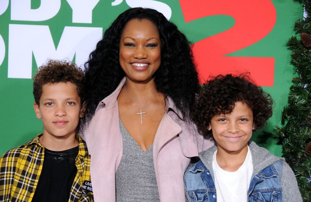 Jade Thomas Nilon, actress Garcelle Beauvais and Jax Joseph Nilon arrive at the premiere of Paramount Pictures' 'Daddy's Home 2' at Regency Village Theatre on November 5, 2017. | Photo: Getty Images