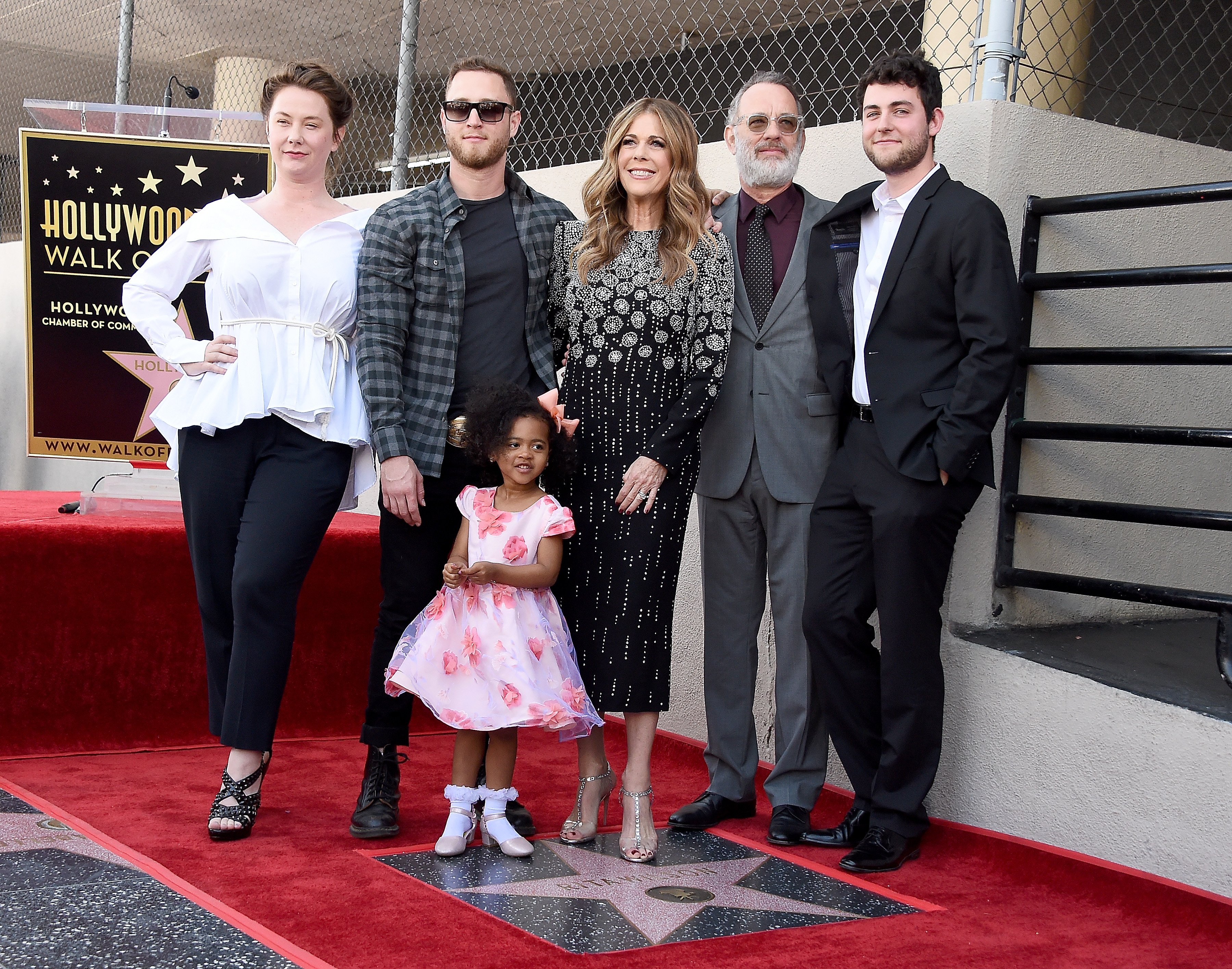 Rita Wilson and Tom Hanks pose with their family as Rita is honored with a star on the Hollywood Walk Of Fame on March 29, 2019 in Hollywood, California. | Source: Getty Images
