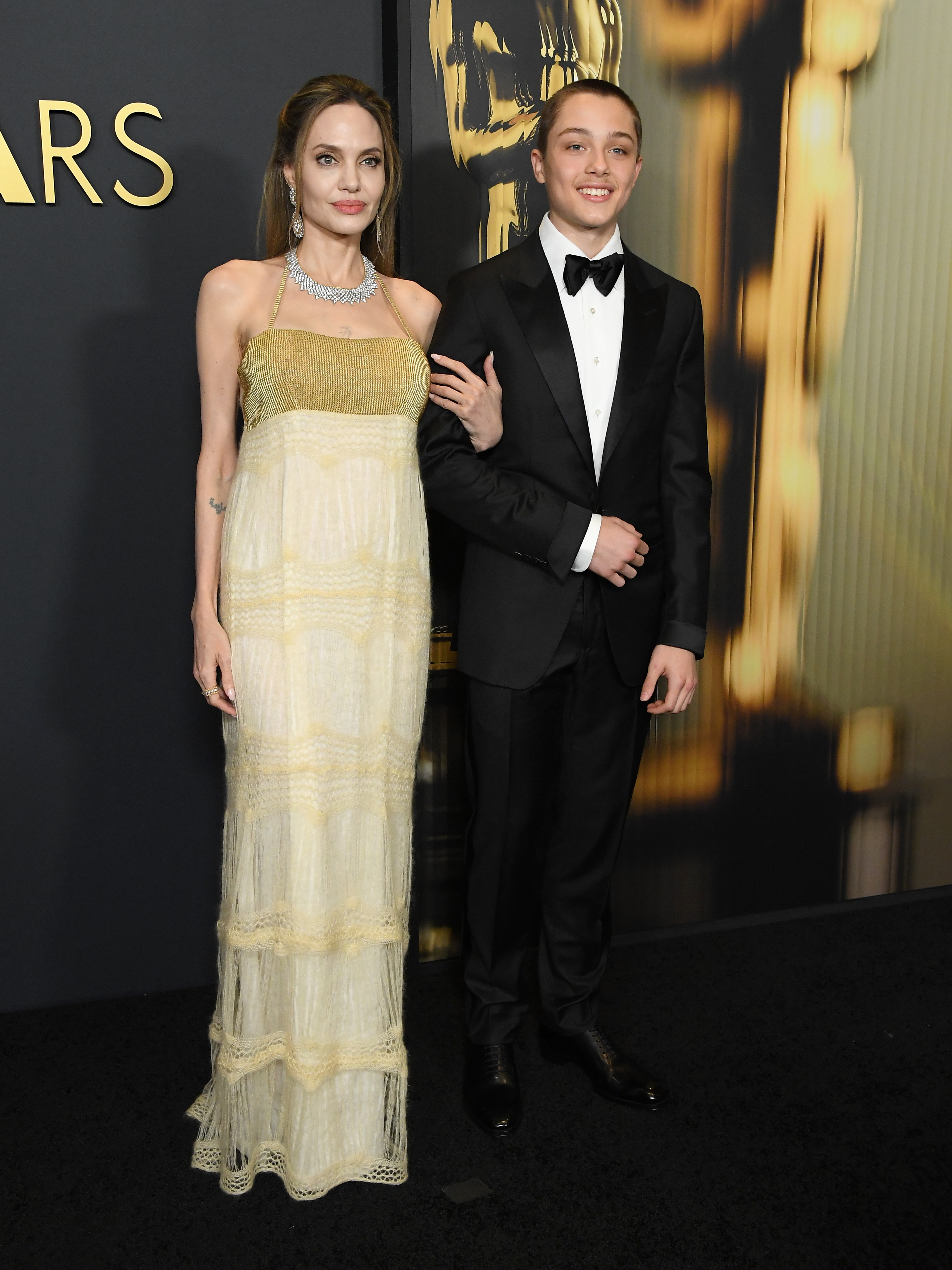 Angelina Jolie and Knox Jolie-Pitt pictured at the 15th Governors Awards on November 17, 2024, in Los Angeles, California. | Source: Getty Images