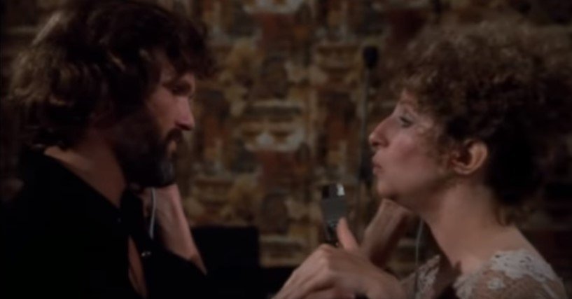 Barbra Streisand and Kris Kristofferson performing a song together | Photo: Youtube/Dugsbugs1