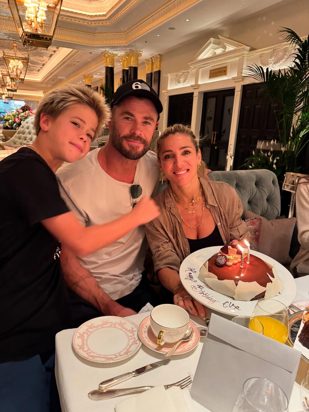 Chris Hemsworth with his son and wife from a post dated July 18, 2025. | Source: Instagram/chrishemsworth