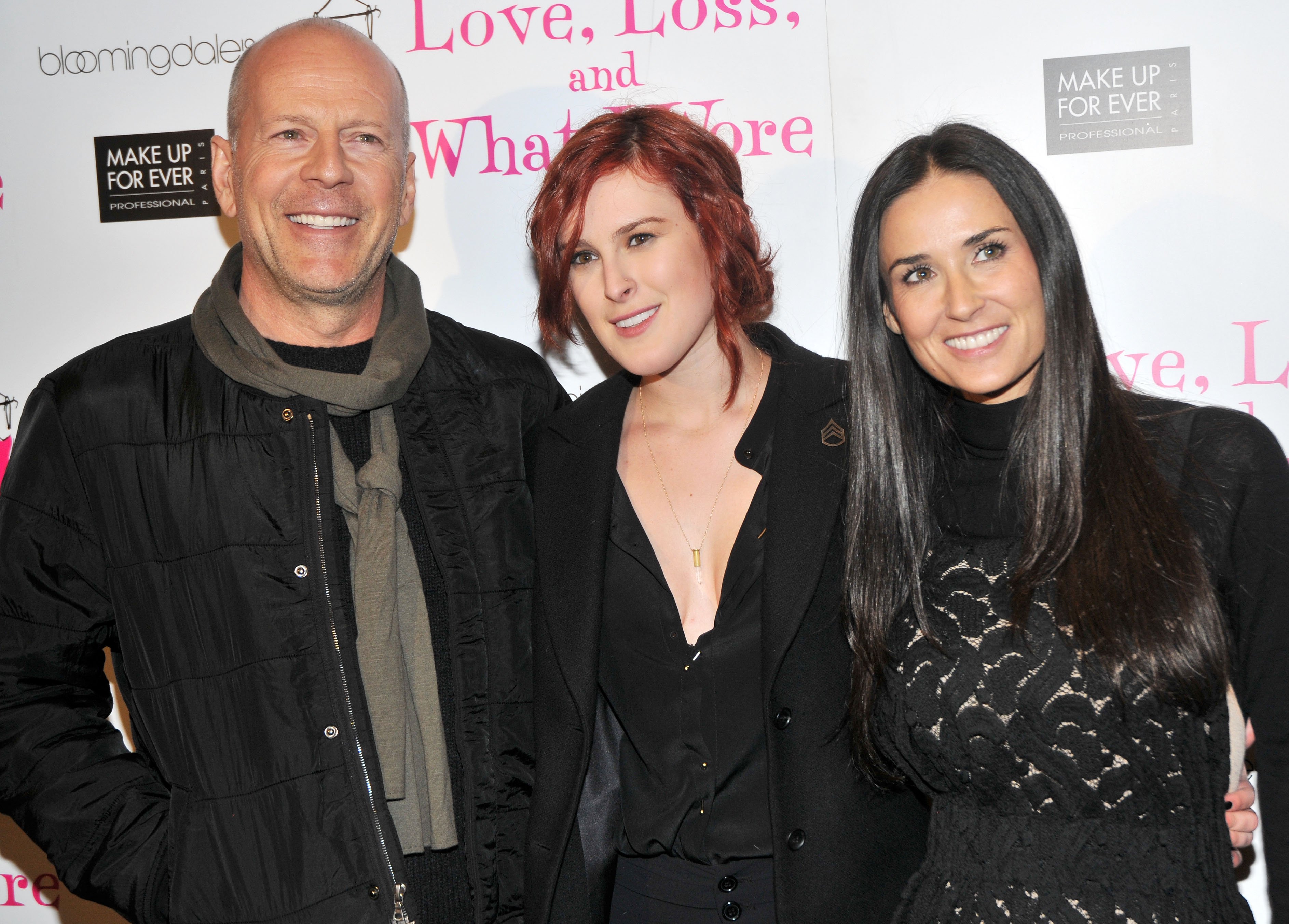 Bruce Willis, daughter Rumer Willis and Demi Moore pose at the "Love, Loss & What I Wore" new cast member celebration at B Smith's Restaurant on March 24, 2011 in New York City | Source: Getty Images