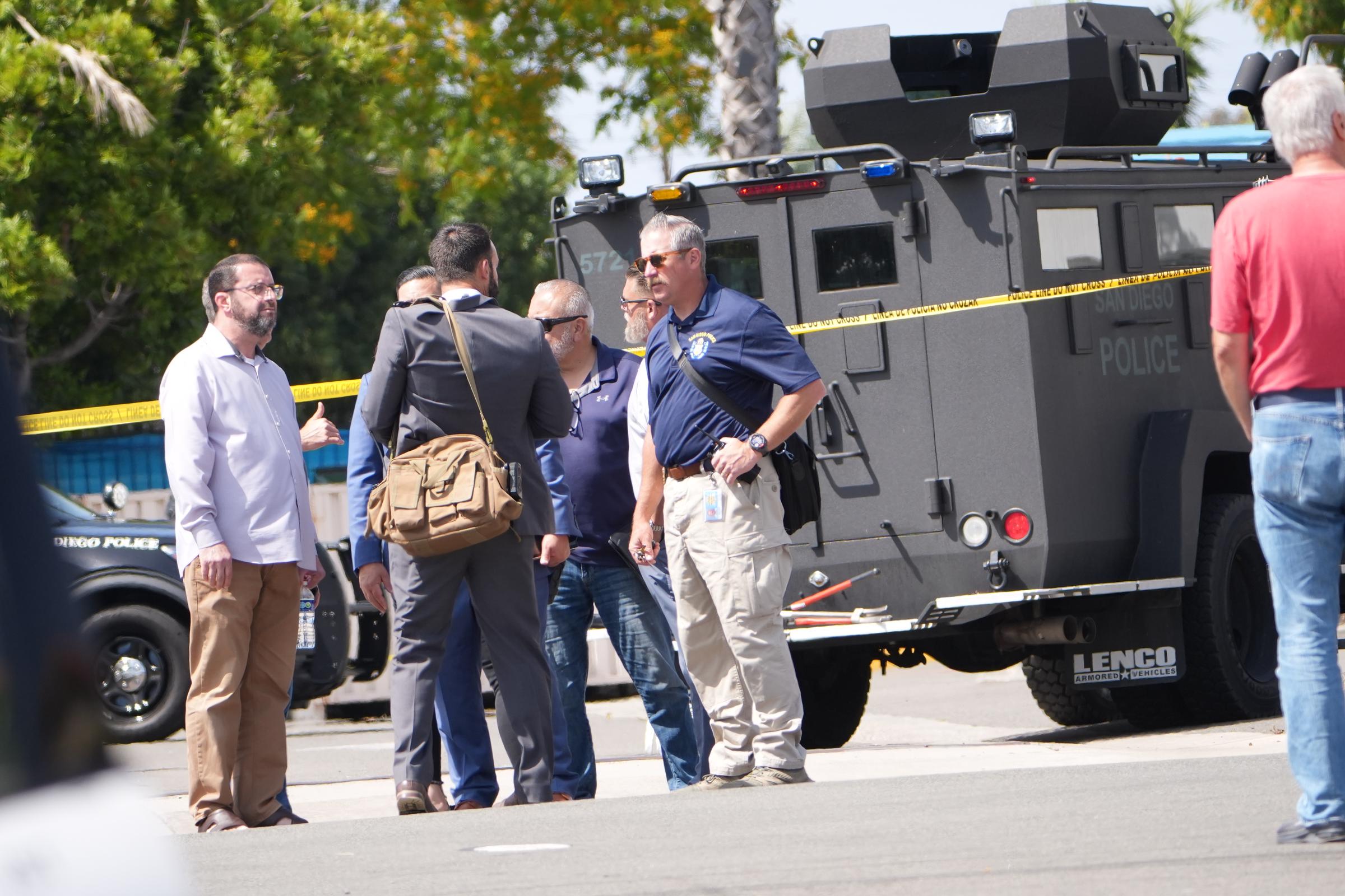 Investigators gather near the mosque as authorities respond to the shooting on May 18, 2026 | Source: Getty Images