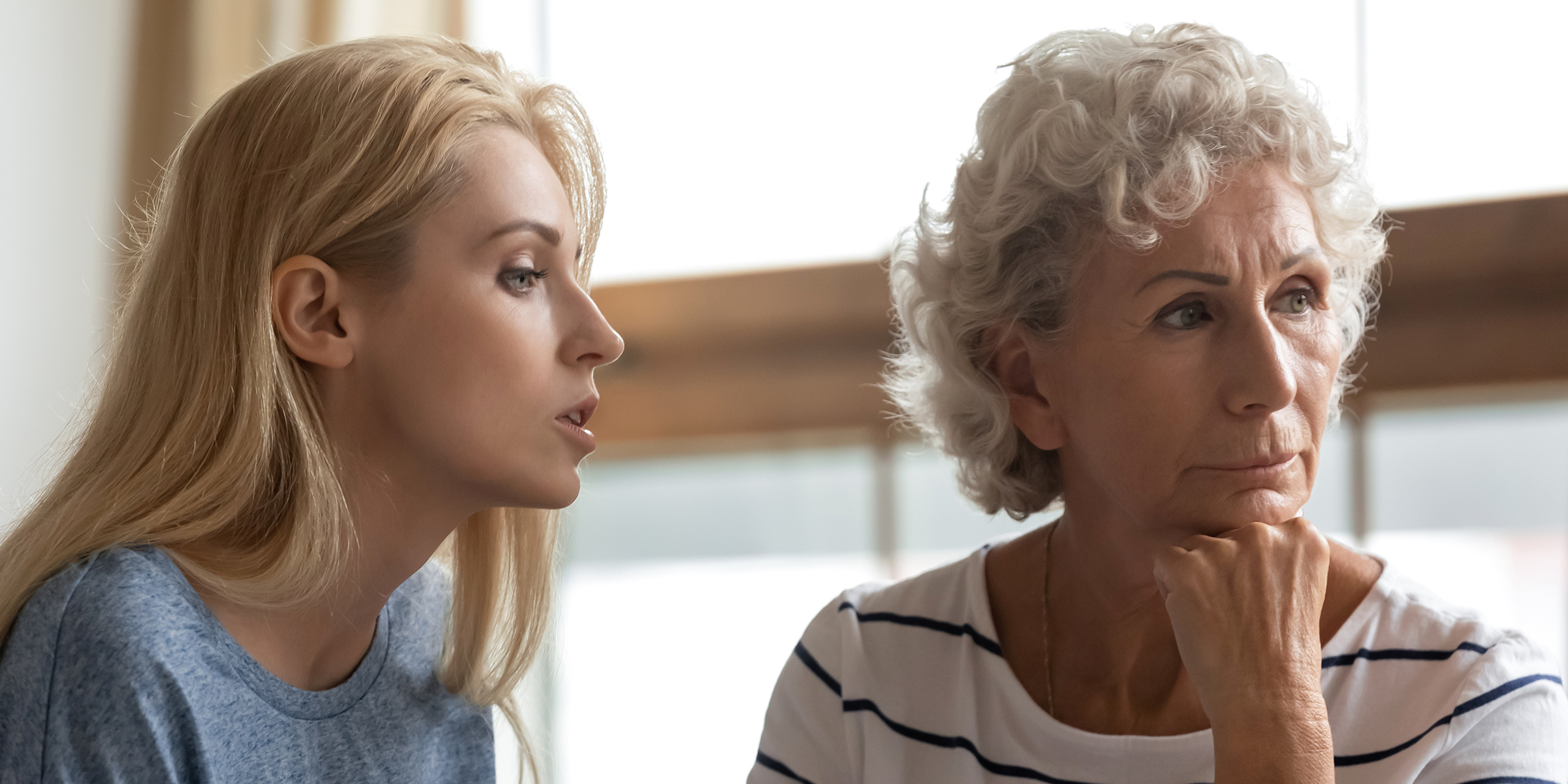 A woman talking to her mother | Source: Shutterstock