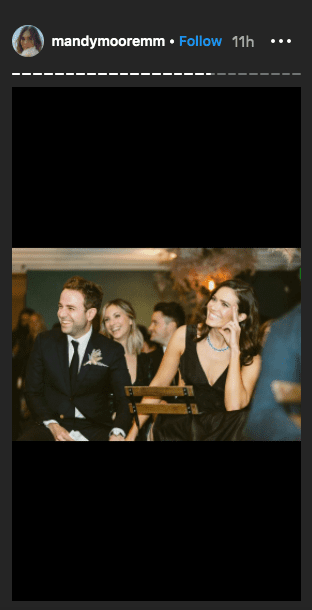 Mandy Moore and her husband, Taylor Goldsmith, holding hands at an event. | Photo: Instagram/mandymooremm