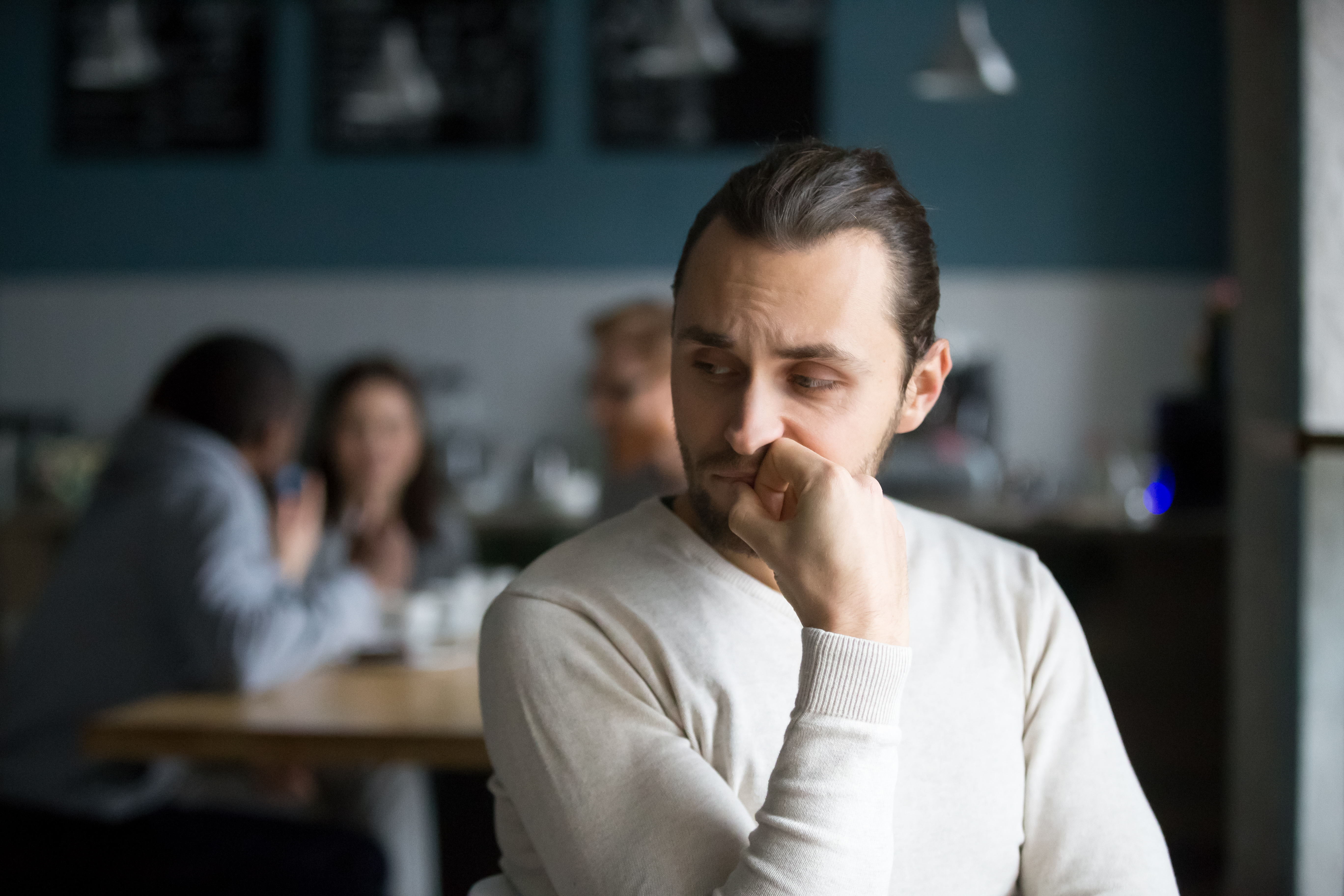 An upset man in a restaurant | Source: Shutterstock