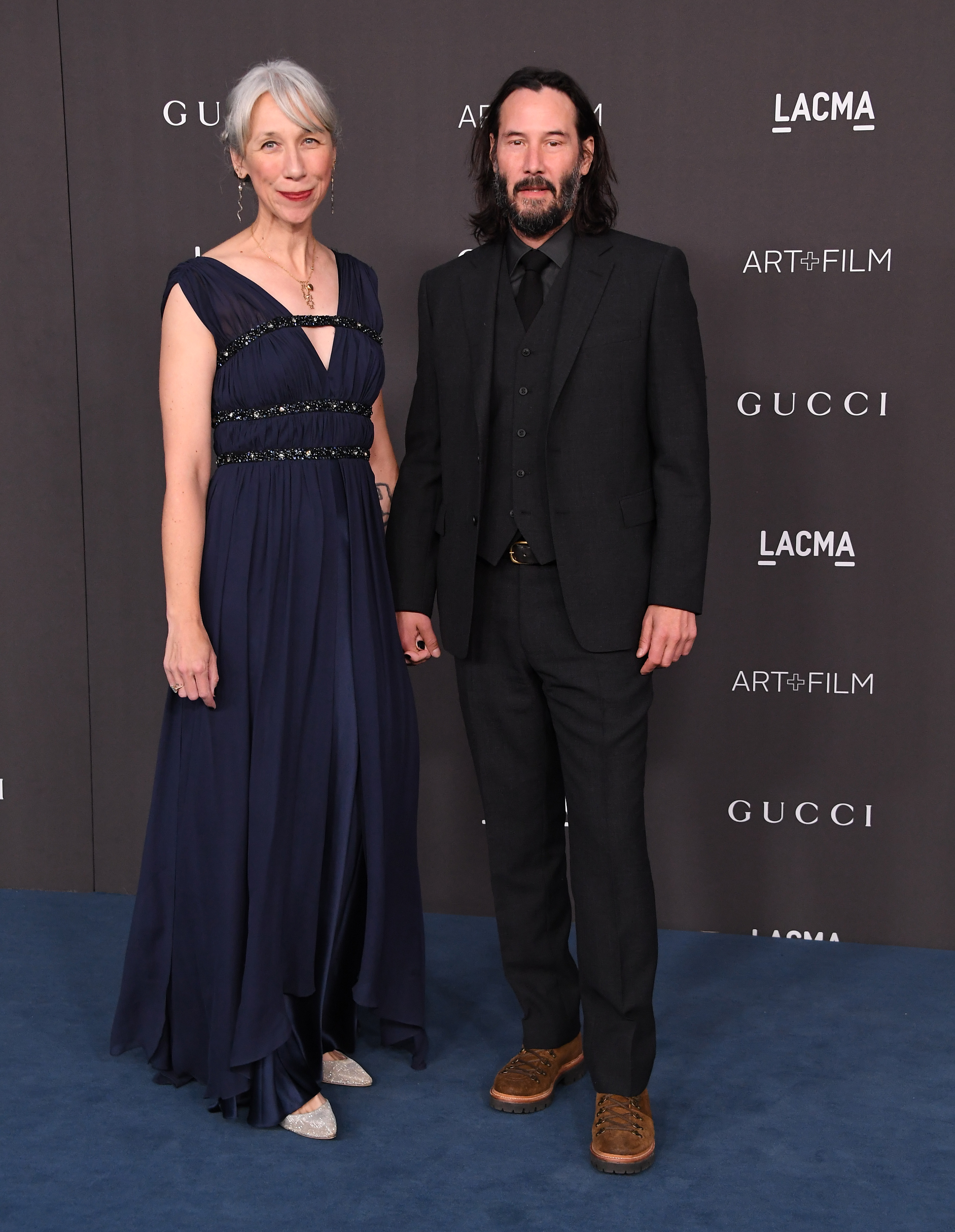 Alexandra Grant and Keanu Reeves hold hands at the LACMA Art + Film Gala in Los Angeles, California on November 2, 2019 | Source: Getty Images