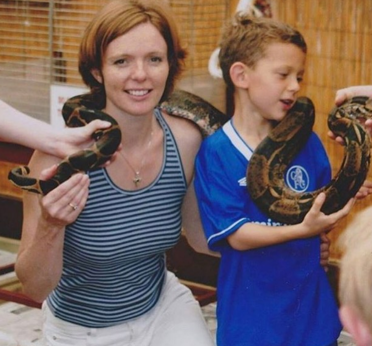 The actor credited his mother for building his path toward acting. Here they are posing with a snake a on photo uploaded on September 3, 2017. | Source: Instagram/tomholland2013