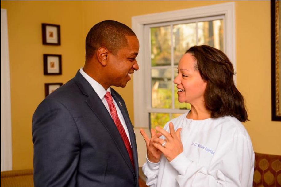Justin Fairfax and Cerina Fairfax share a warm, candid moment indoors, facing each other in conversation. | Source: Facebook/JustinFairfax