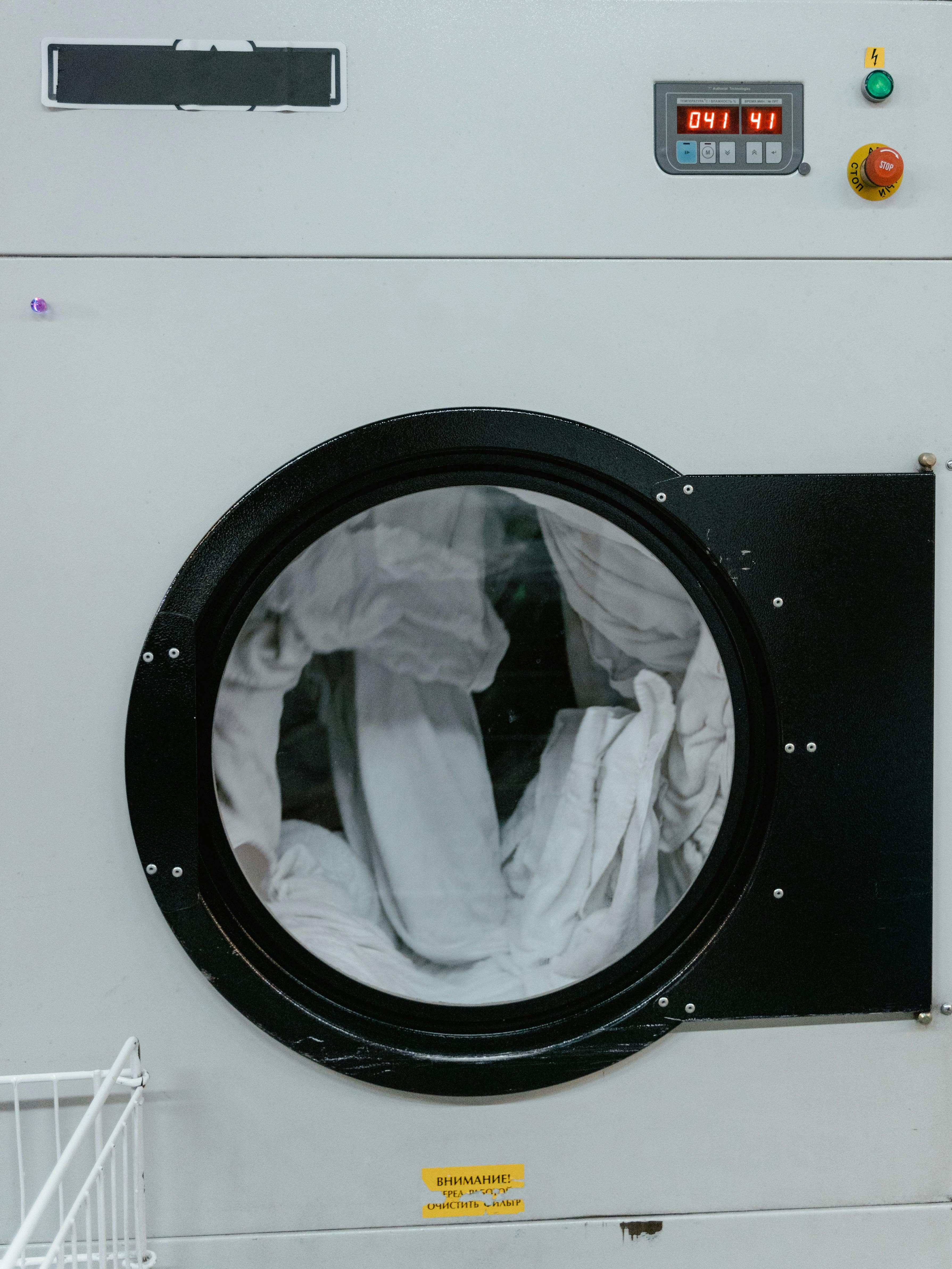 Clothes getting washed in a washing machine | Source: Pexels