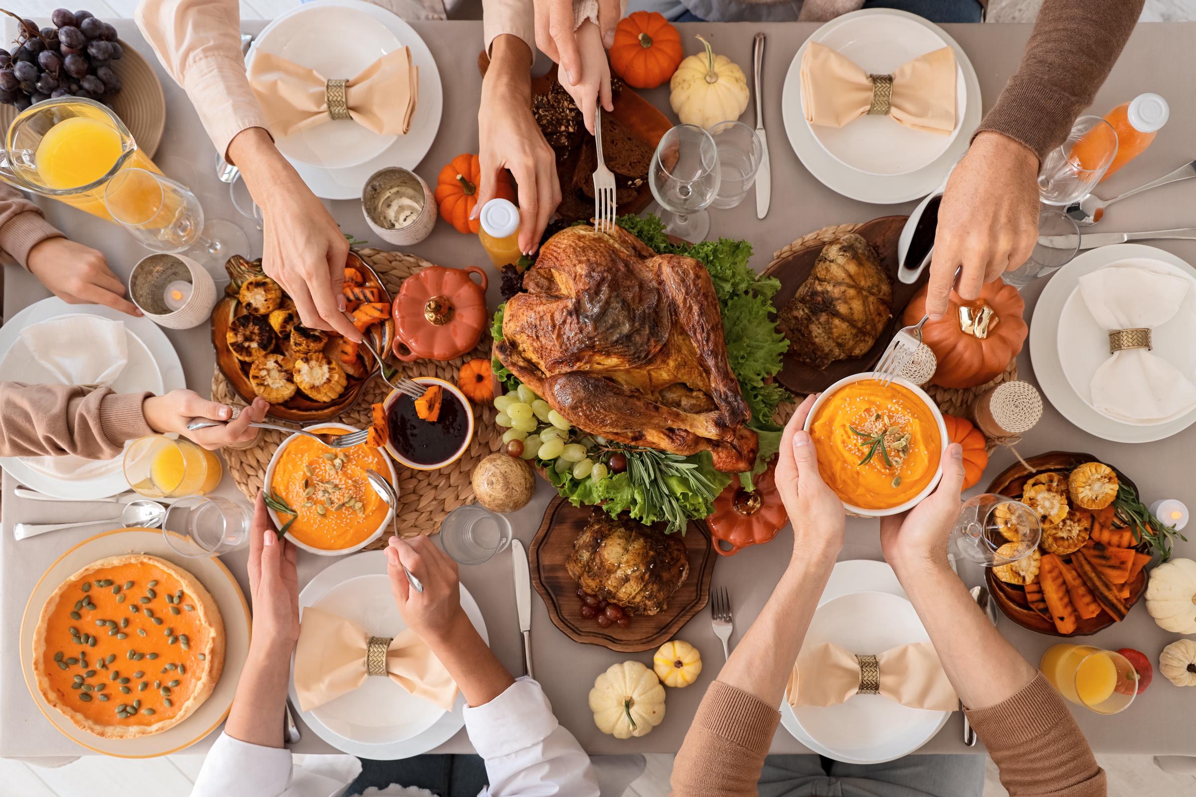 People gathered for Thanksgiving dinner | Source: Shutterstock