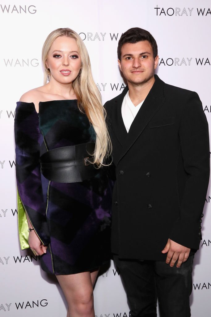 Tiffany Trump (L) and Michael Boulos pose backstage for Taoray Wang fashion show during New York Fashion Week: The Shows at Gallery II at Spring Studios | Photo: Getty Images
