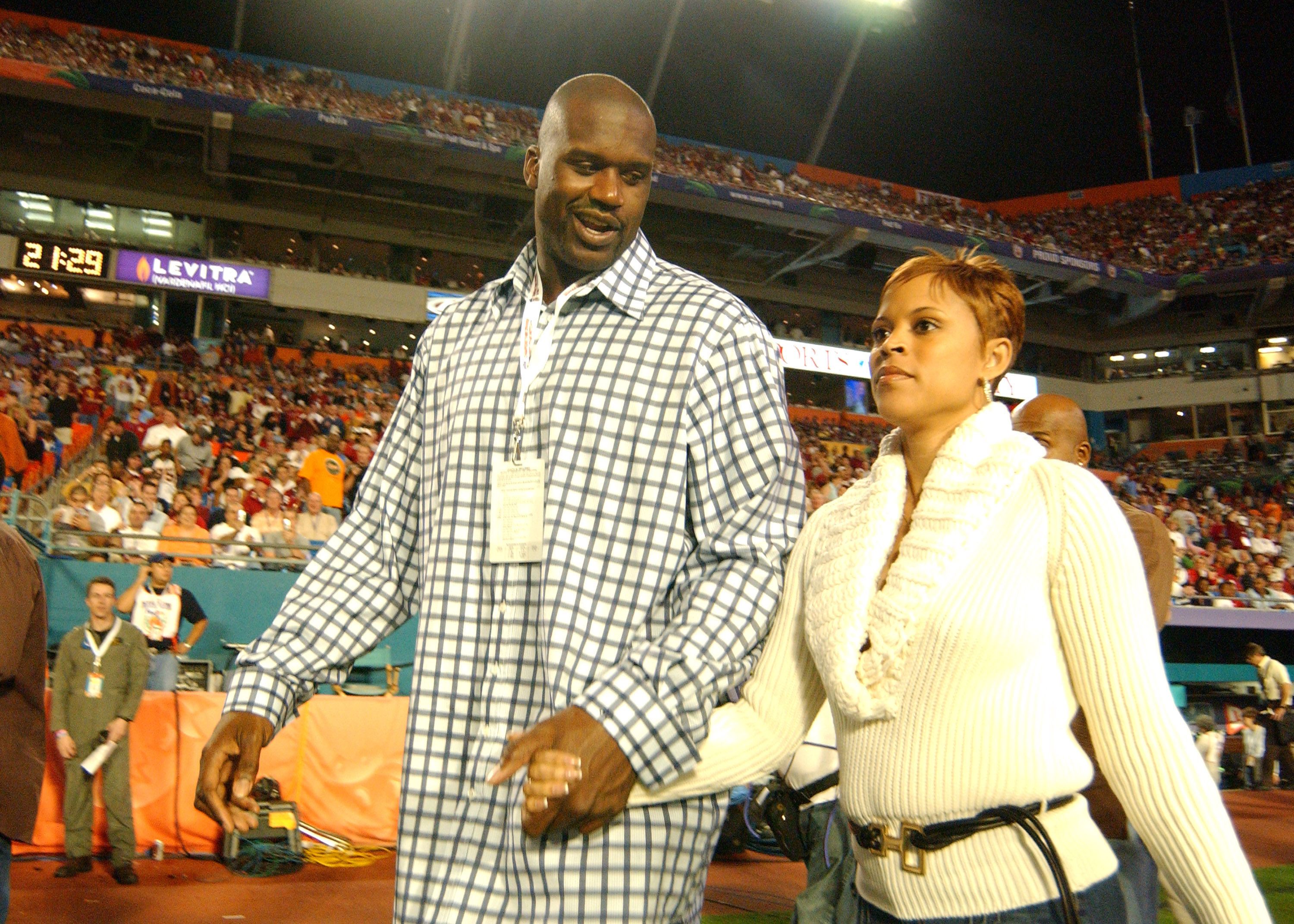 Shaquille O'Neal and wife Shaunie attend the FedEx Orange Bowl National Championship at Pro Player Stadium in Miami, Florida on January 4, 2005. | Source: Getty Images