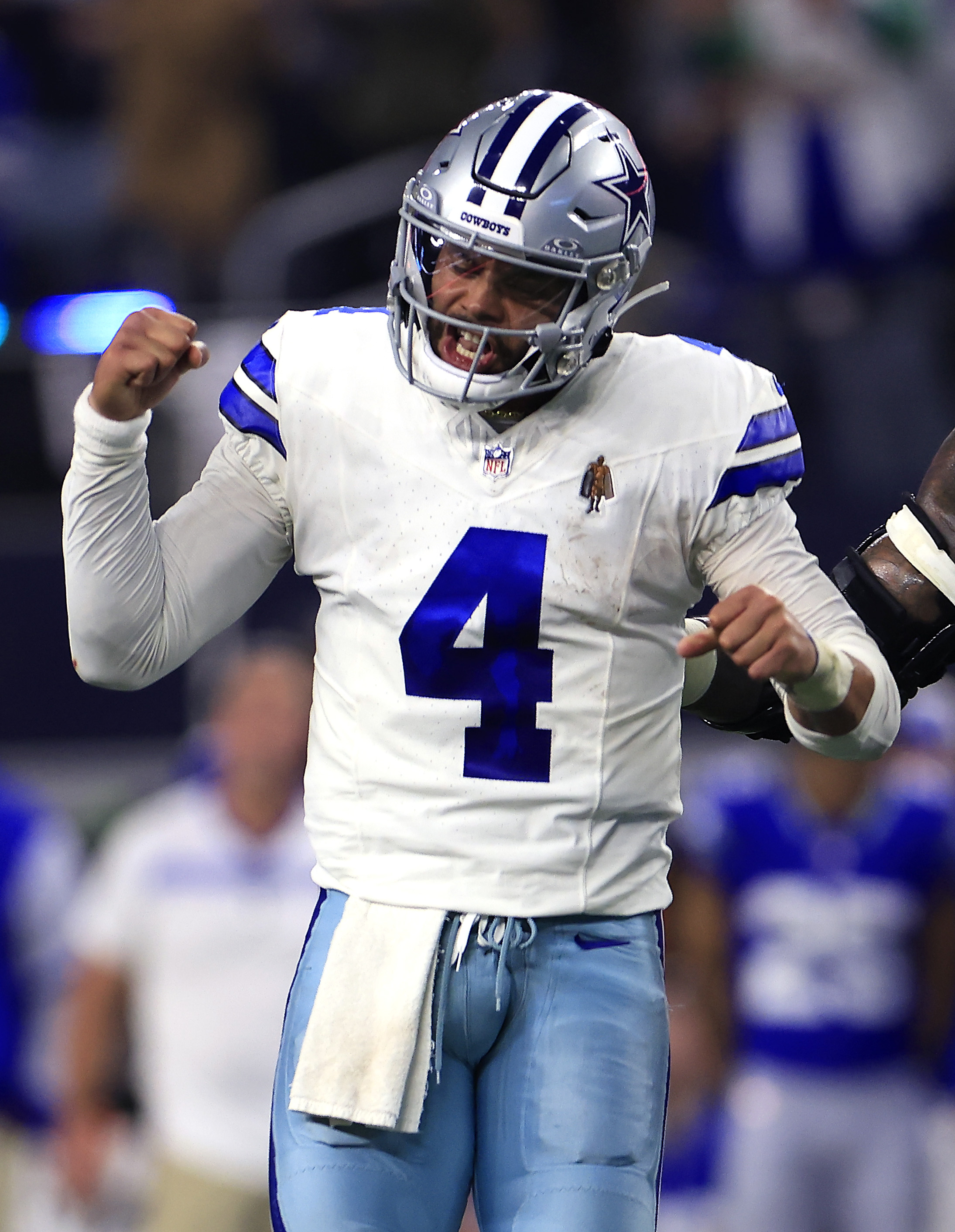 Dak Prescott #4 of the Dallas Cowboys celebrates after throwing for a touchdown on November 30, 2023 | Source: Getty Images