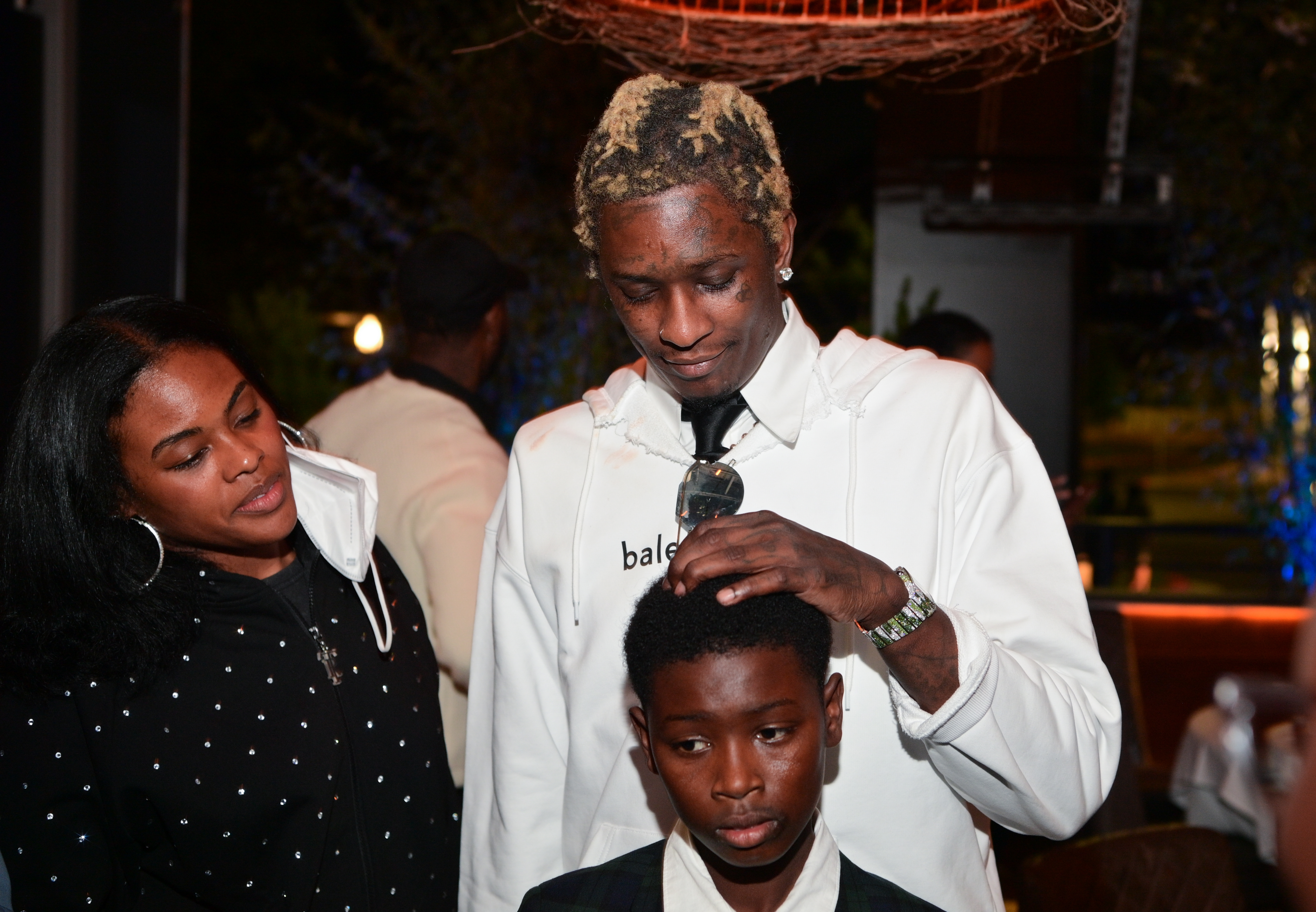 Rayna Bass, Young Thug, and his son attend Slime Language 2 #1 Album Event at Annette's Chop House on April 26, 2021, in Atlanta, Georgia. | Source: Getty Images