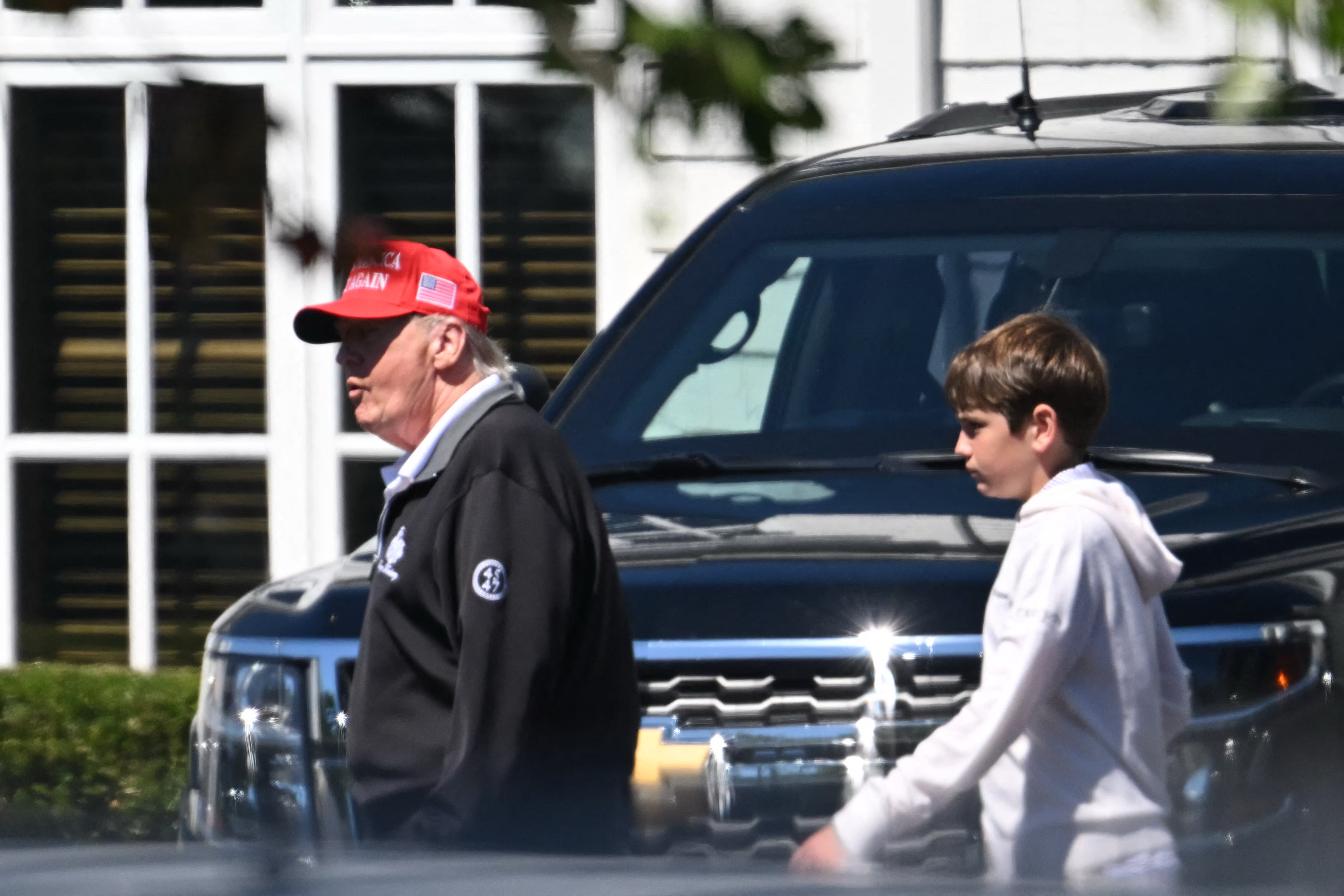Donald and Spencer Frederick Trump at Trump National golf course in Sterling, Virginia, on August 30, 2025. | Source: Getty Images
