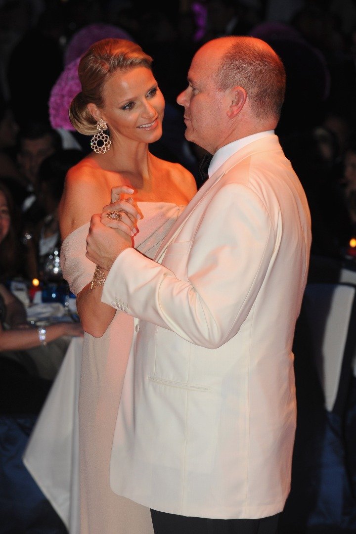  Prince Albert II of Monaco and his fiancee Charlene Wittstock dance during the 62nd Monaco Red Cross Ball at the Sporting Club Monte Carlo on July 30, 2010 | Source: Getty Images