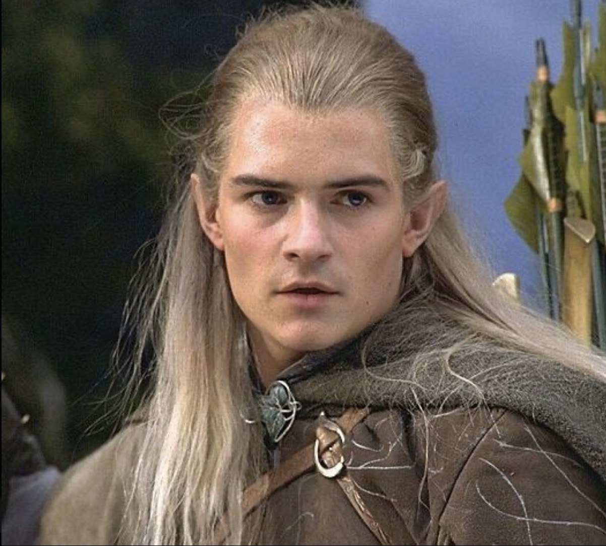 In "The Fellowship of the Ring," Orlando Bloom played Legolas, the sharp-eyed Elven archer from Mirkwood whose agility and calm precision added an ethereal edge to the Fellowship. With his long platinum hair, pointed ears and unwavering gaze, Bloom brought a stoic strength to a character who moved through battle like poetry. | Source: The Fellowship of the Ring