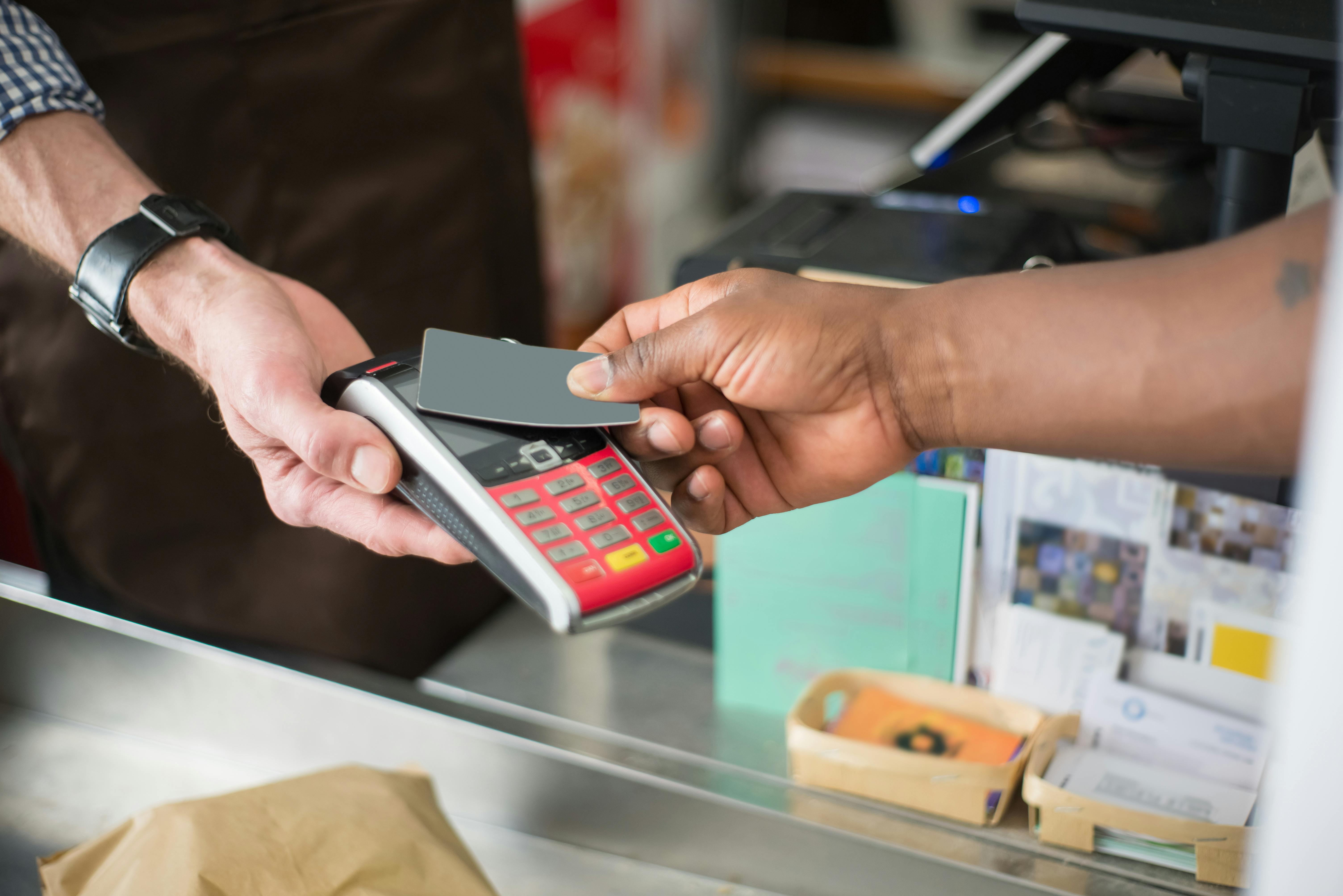 A person paying using a bank card | Source: Pexels