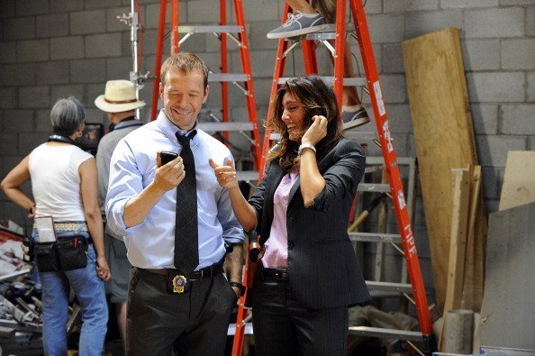 Danny (Donnie Wahlberg) and Jackie (Jennifer Esposito) behind the scenes on "Blue Bloods" | Photo: Getty Images