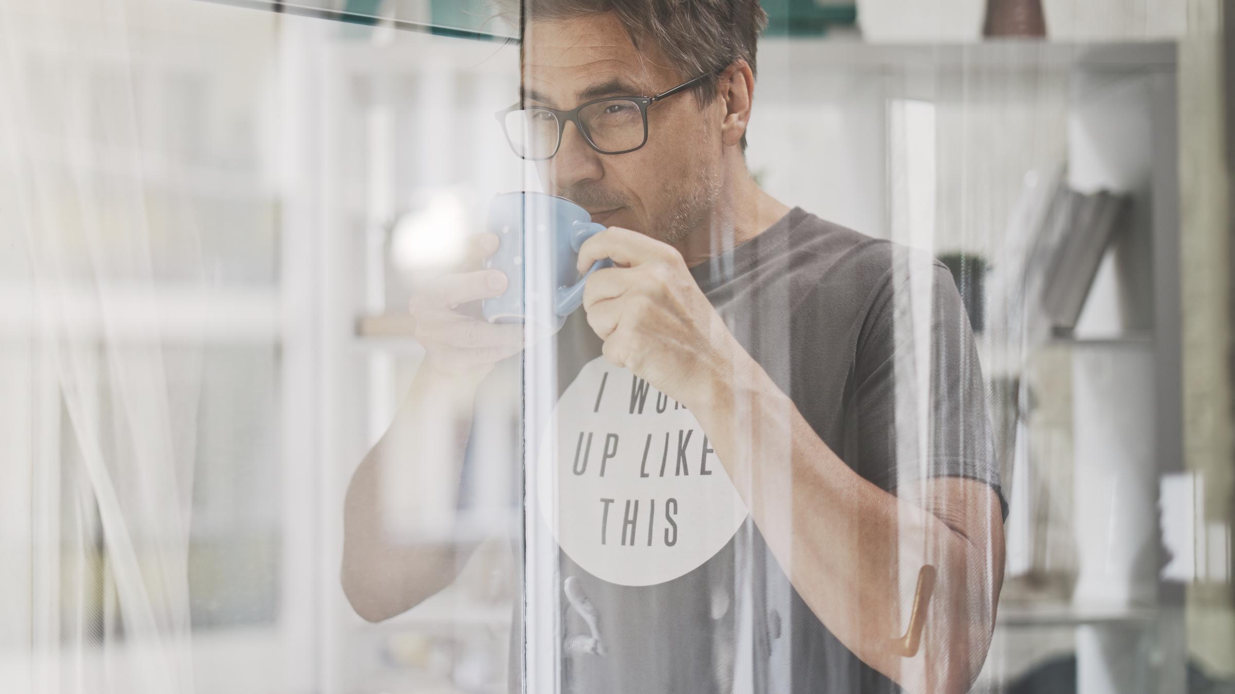 A man drinking coffee in the morning | Source: Shutterstock