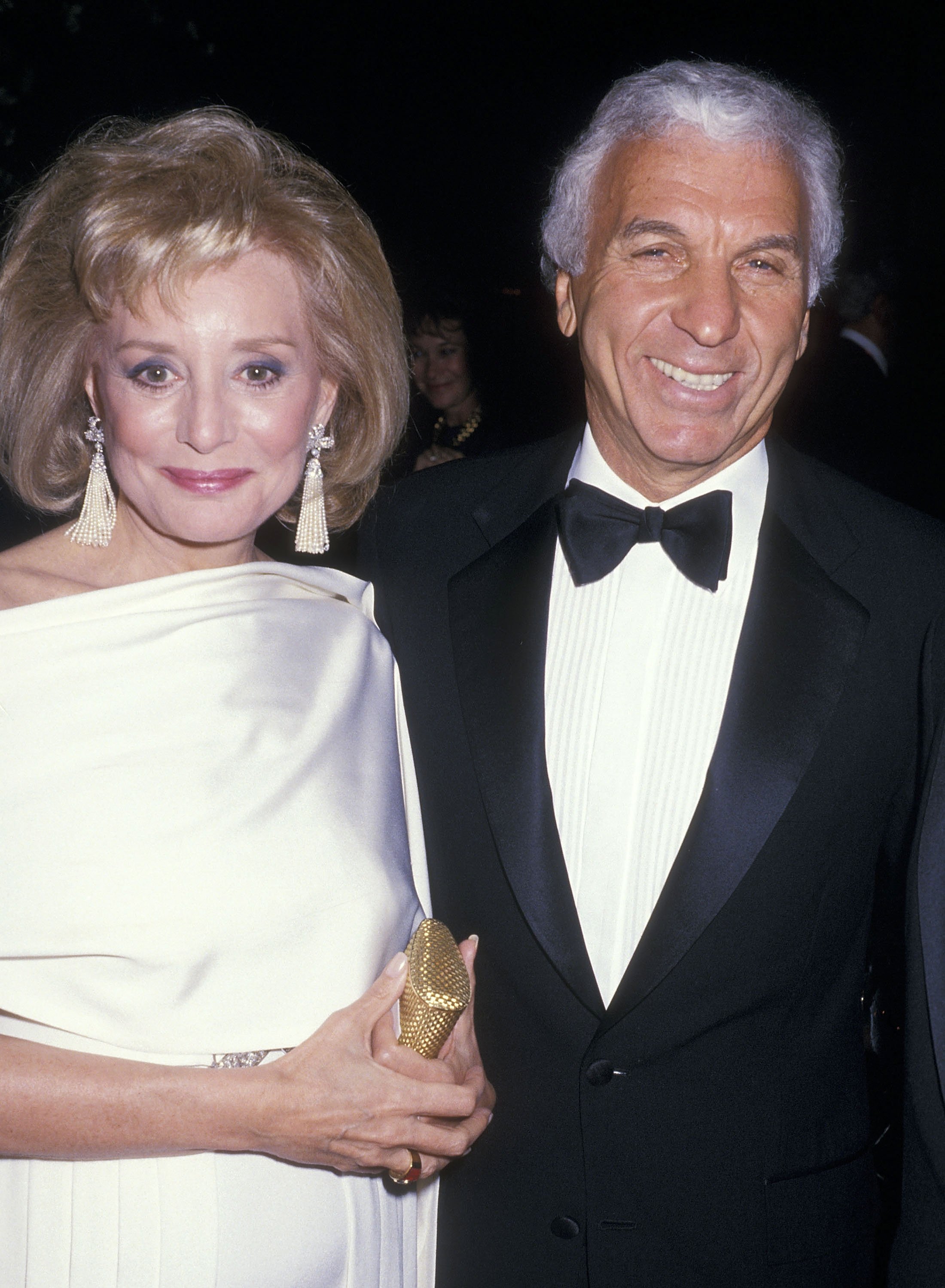 TV journalist Barbara Walters and entertainment executive Merv Adelson at "The Ten Treasures" Opening Night Exhibition Gala on May 19, 1988 at the New York Public Library, 42nd Street in New York City.  | Source: Getty Images