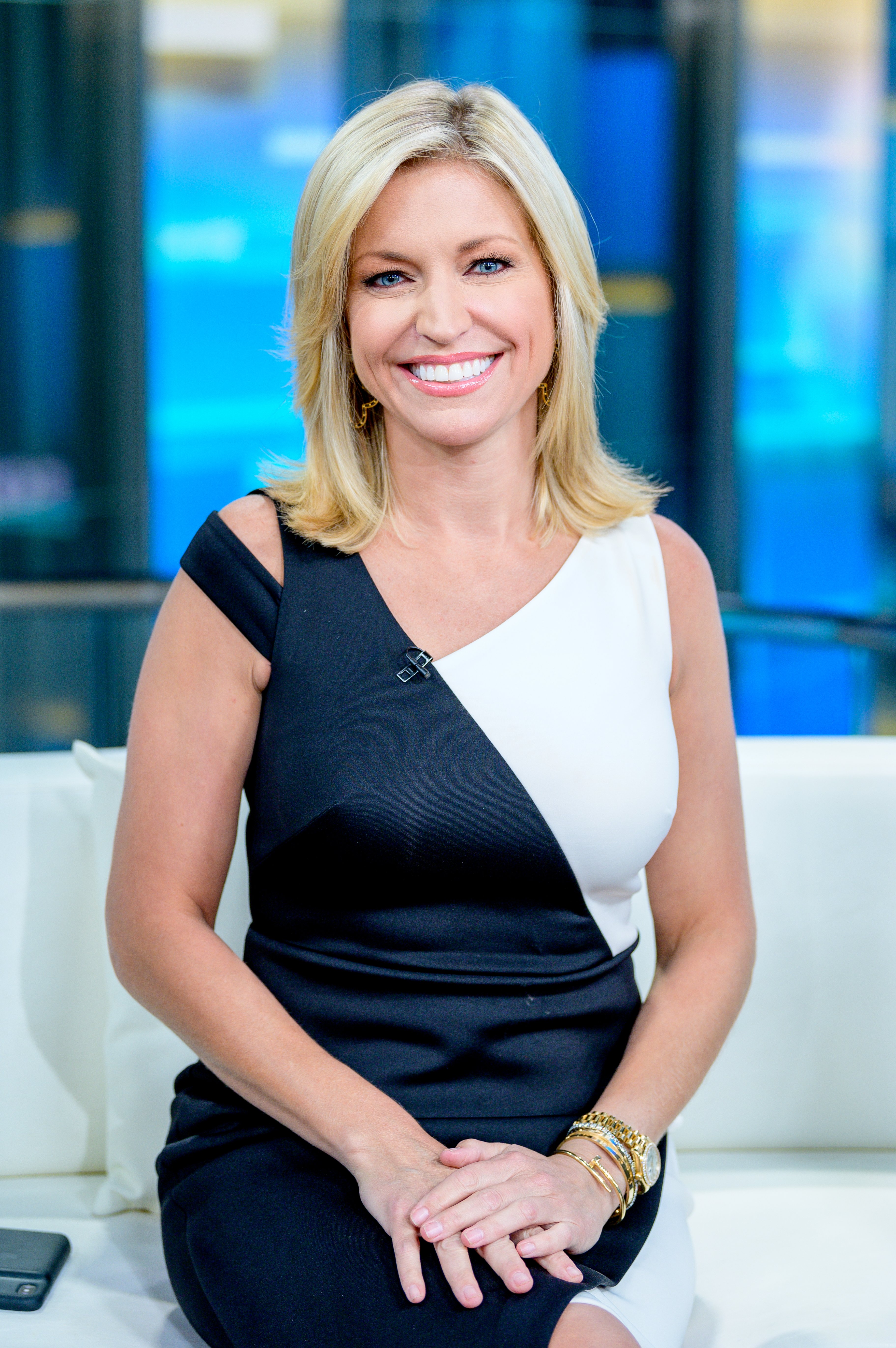 Host Ainsley Earhardt as US Open winner Gary Woodland visits "FOX & Friends" at Fox News Channel Studios on June 18, 2019 in New York City | Source: Getty Images