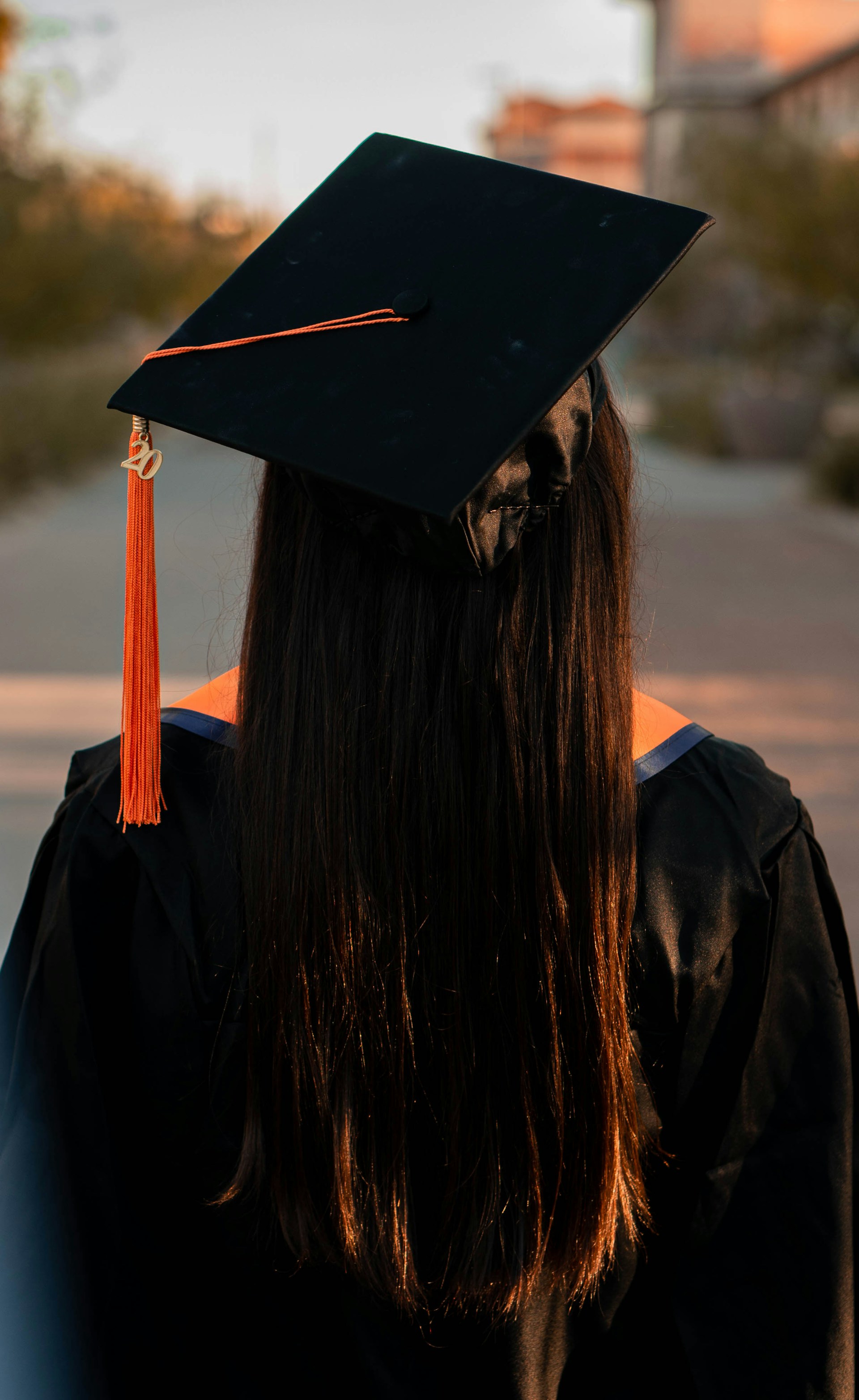 A woman wearing a graduation gown and cap | Source: Unsplash