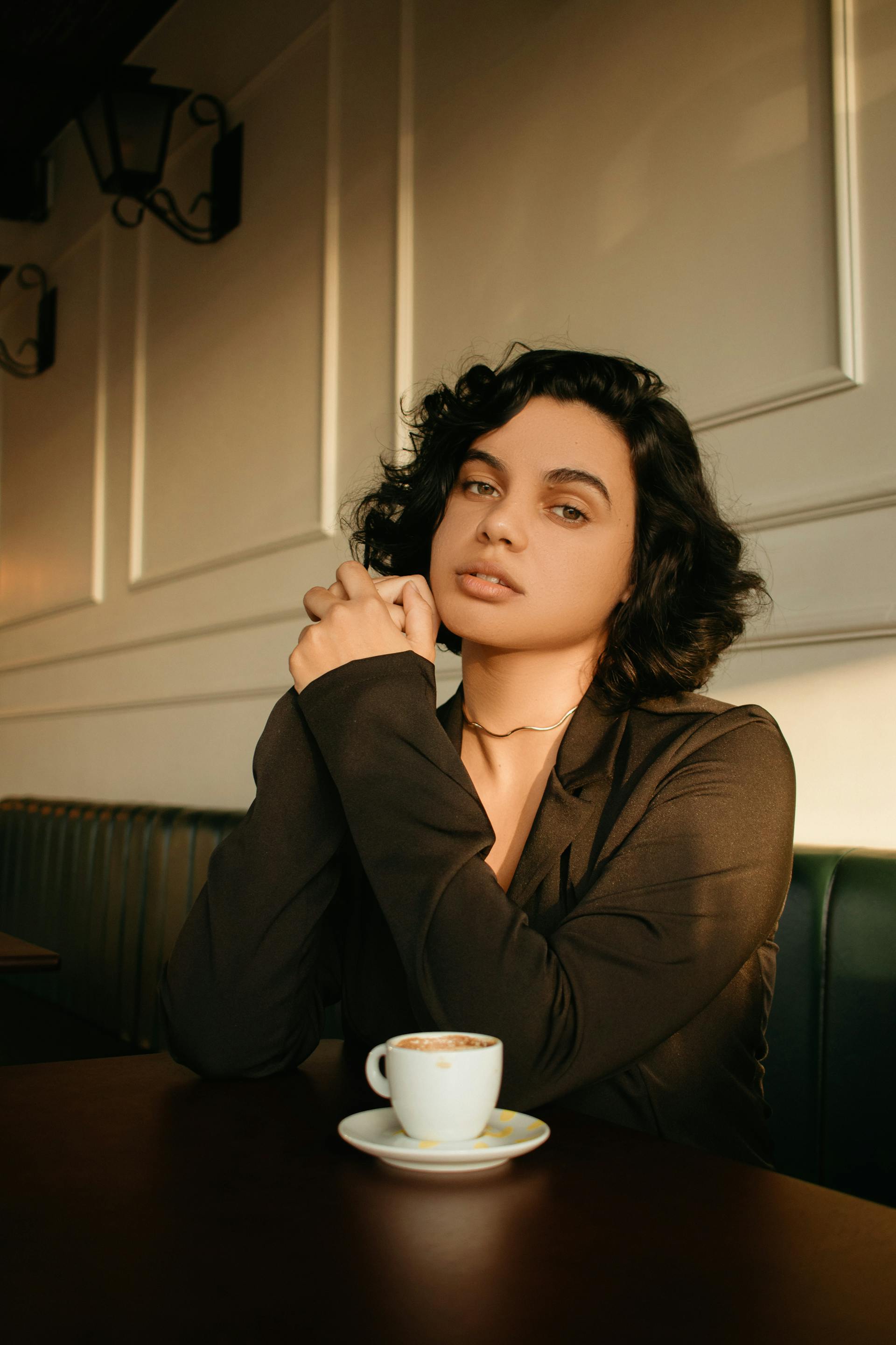 A woman in a cafe | Source: Pexels