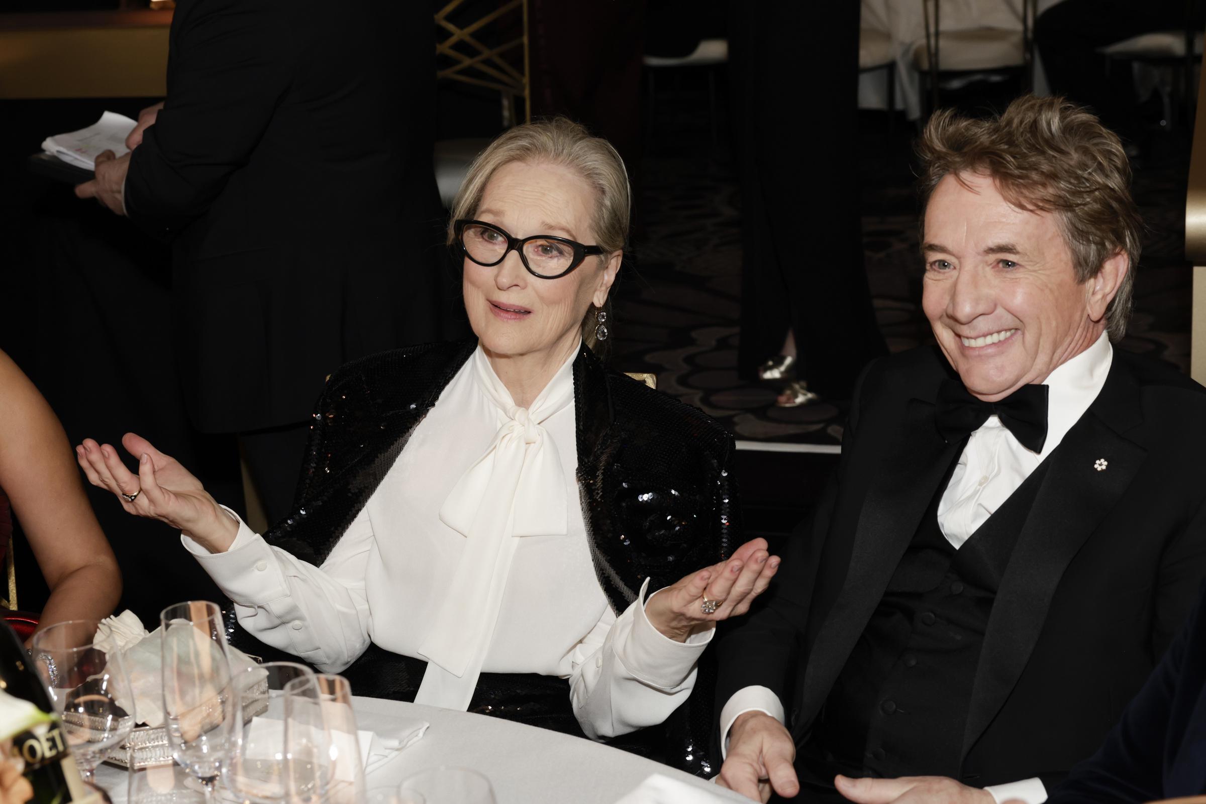 Meryl Streep and Martin Short sit together at the 81st Annual Golden Globe Awards in Beverly Hills, California on January 7, 2024. | Source: Getty Images