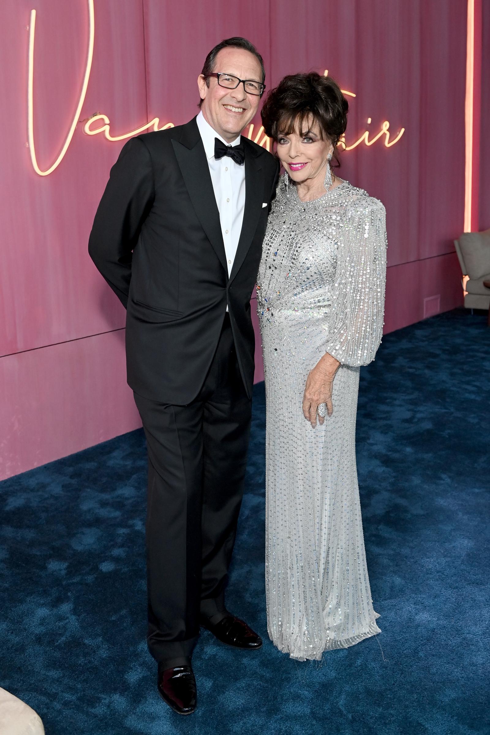 Percy Gibson and Joan Collins attend the Vanity Fair Oscar Party hosted by Radhika Jones in Beverly Hills, California, on March 27, 2022. | Source: Getty Images