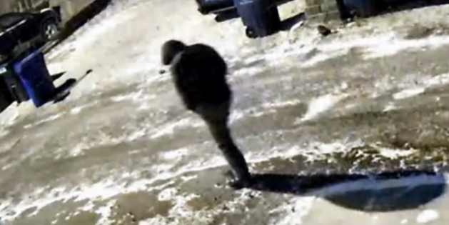 Person of interest walking in a snow-covered alley near the Tepe home | Source: Facebook/ColumbusPolice