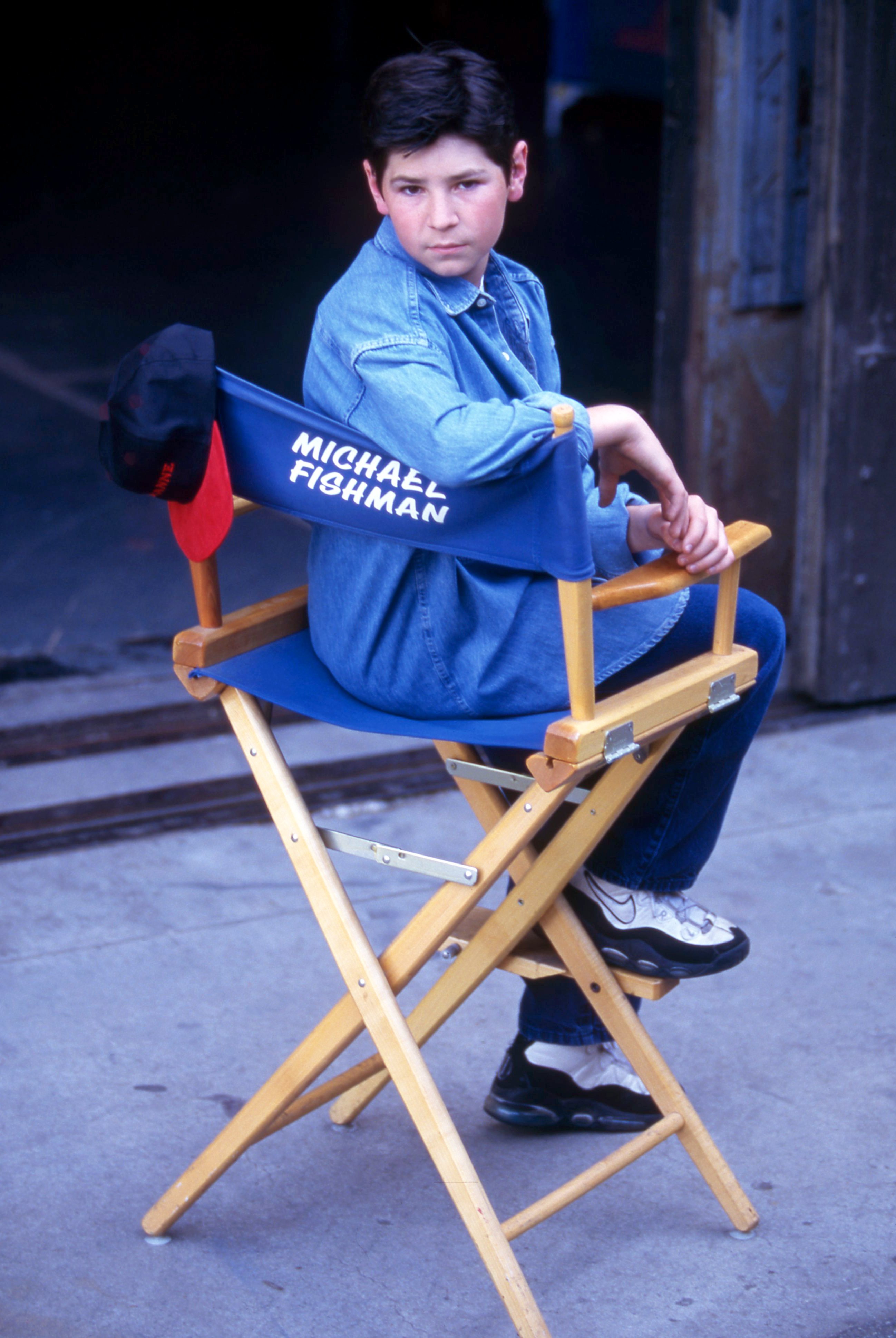 Michael Fishman poses for a portrait on the lot outside of the soundstage for "Roseanne" in 1990 in Los Angeles, California. | Source: Getty Images