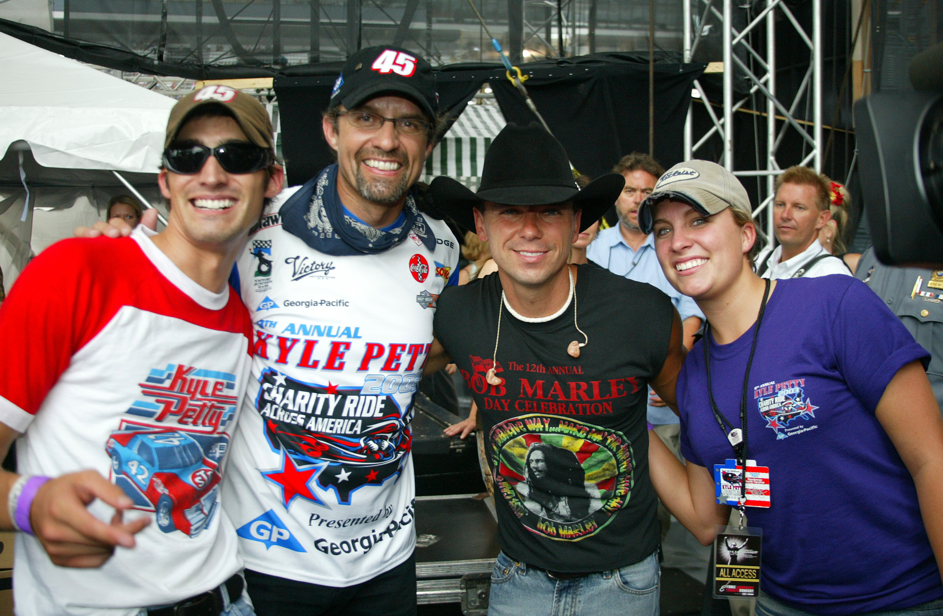 Kyle Petty, Austin Petty, Kenny Chesney, and Montgomery Lee Petty on June 28, 2003. | Source: Getty Images