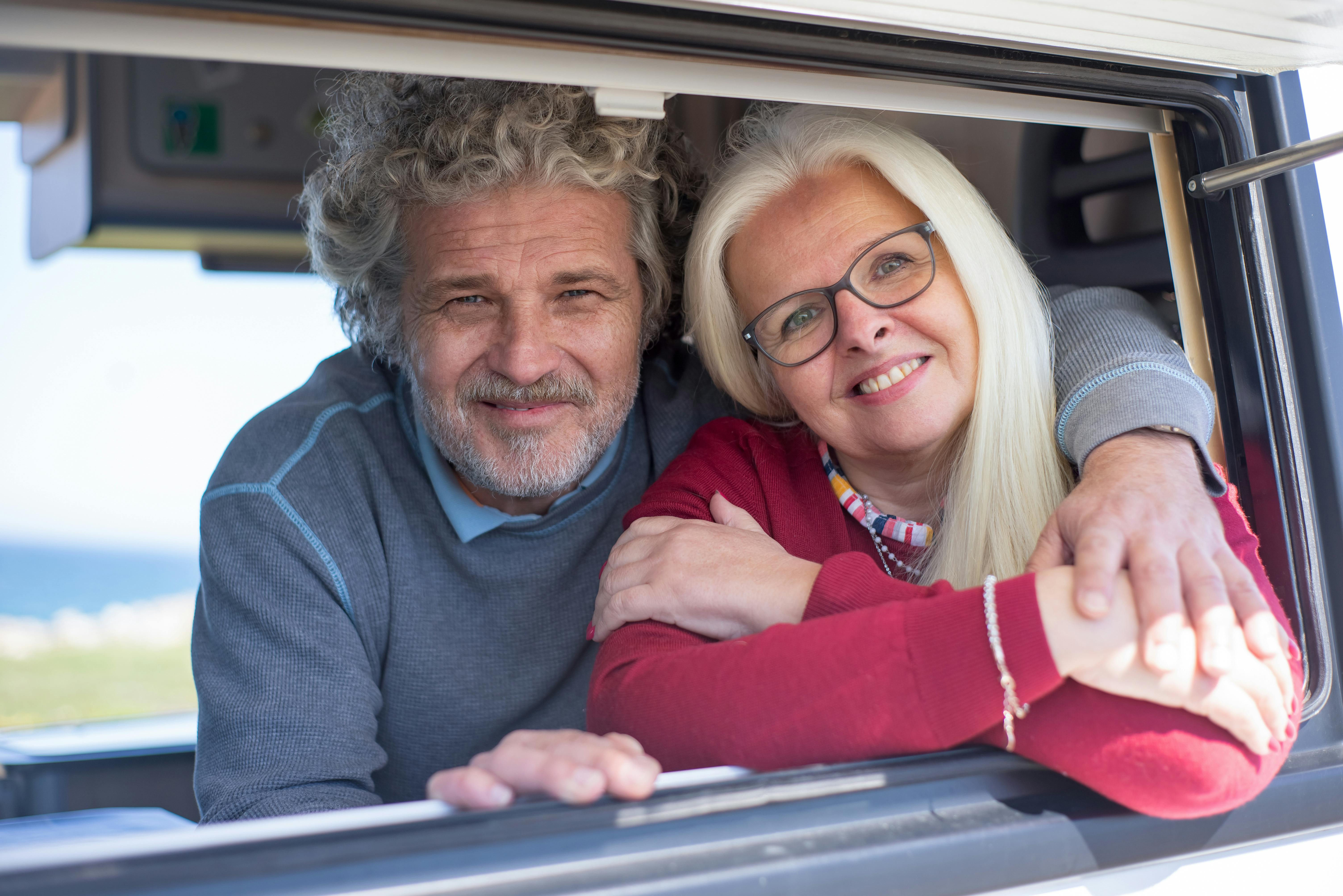 An elderly couple inside a car together | Source: Pexels